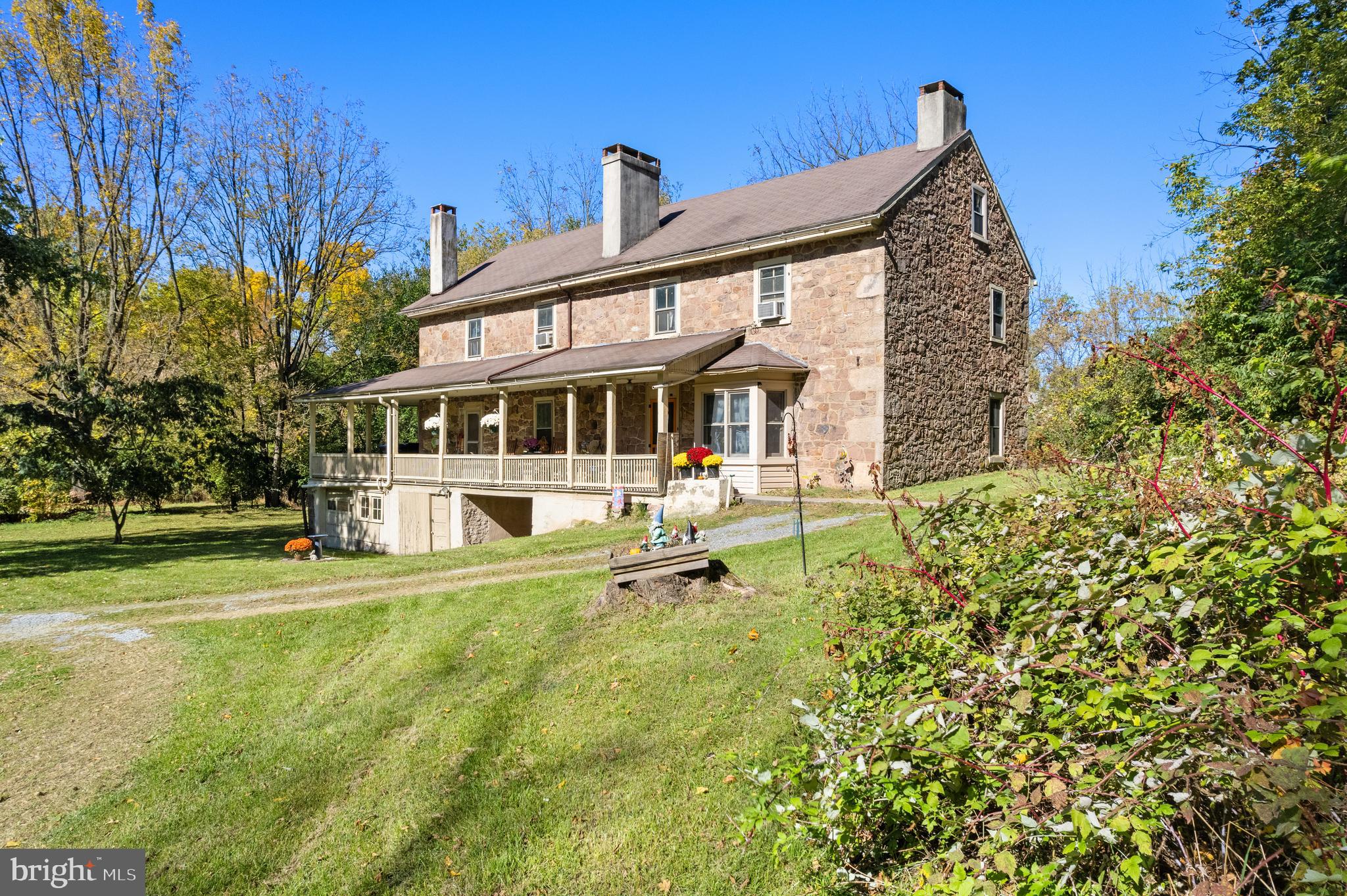 Step into history with this charming stone farmhouse, a captivating 1768-built home nestled on 1.37 acres of private bliss. This historic gem boasts a rich tapestry of stories, having witnessed the echoes of a distillery, Graham’s Mill, and an inn in its storied past. With exposed beams, a rustic stone fireplace, and stone exterior, each corner exudes character.
Nature enthusiasts will be enchanted by the property's natural wonders—bordered by the meandering Gooseneck Creek, decorated with mature black walnut trees, a graceful mimosa tree, and a symphony of honeysuckle. Wildlife flourishes in this tranquil haven.
The residence itself offers a cozy haven with 3 bedrooms and 2.5 bathrooms. Additionally, three outbuildings on the property provide versatile spaces for your imagination to roam.