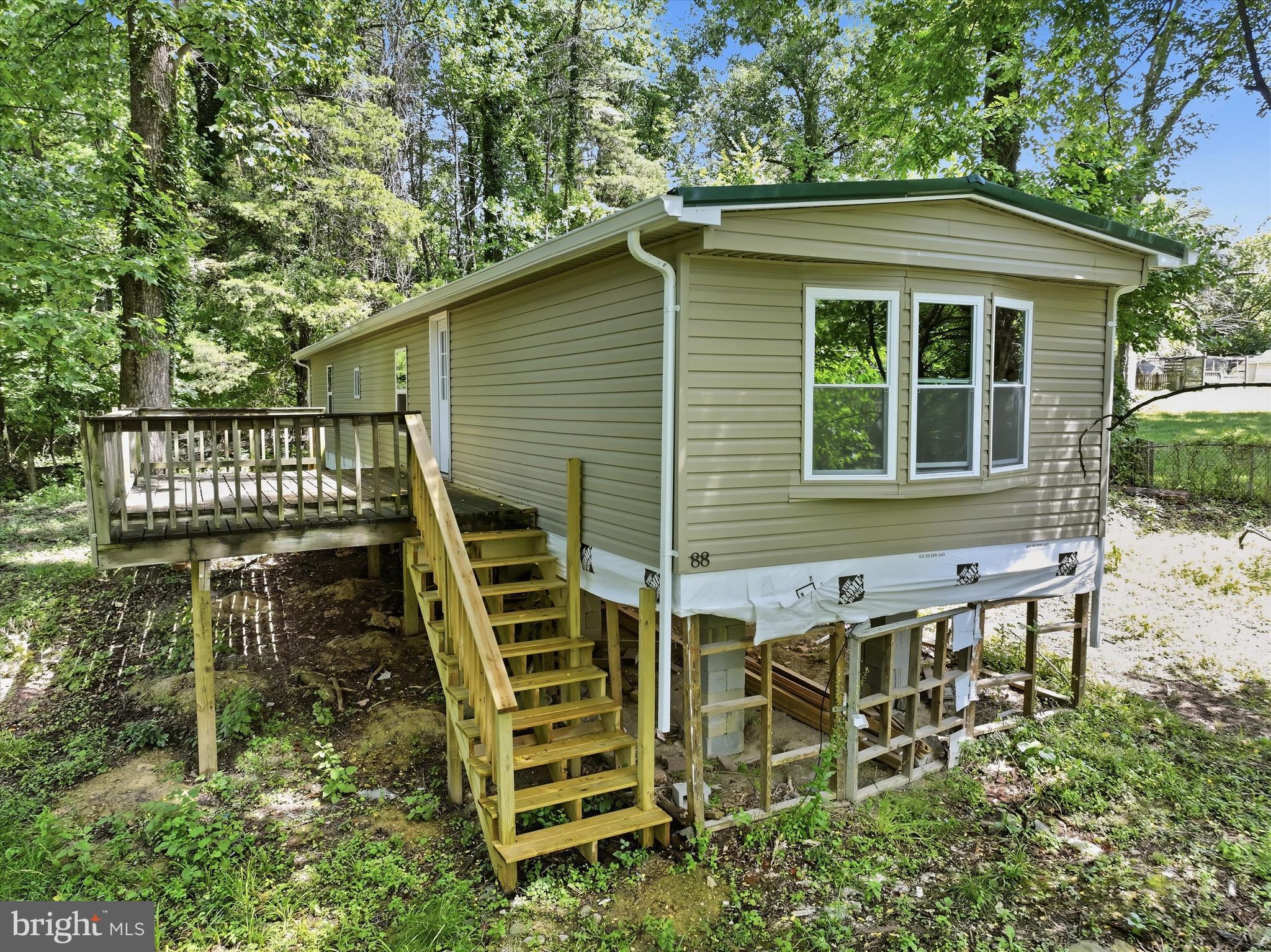 WOW, what an opportunity! Build equity and create your dream retreat just minutes from the beautiful Shenandoah and Potomac Rivers, with convenient access to both Virginia and Maryland state lines. Enjoy the peace and tranquility of fresh mountain air, mature trees, and a private setting surrounded by nature. This property is located just around the corner from the mountains, Appalachian Trail, and endless outdoor adventures.
This unique offering includes Lot 306, Lot 306A, and Lot 307, providing additional space and possibilities. The current owner has already completed several major improvements, including a brand-new roof, new siding, and a new deck. The mobile home has been completely gutted, creating a blank slate ready for the next owner to customize and finish to their own vision.
The mobile home is being sold as-is, offering an incredible opportunity for investors, weekend getaway seekers, or buyers looking to bring their ideas to life. Don’t miss your chance to own a piece of mountain living at an exceptional value!