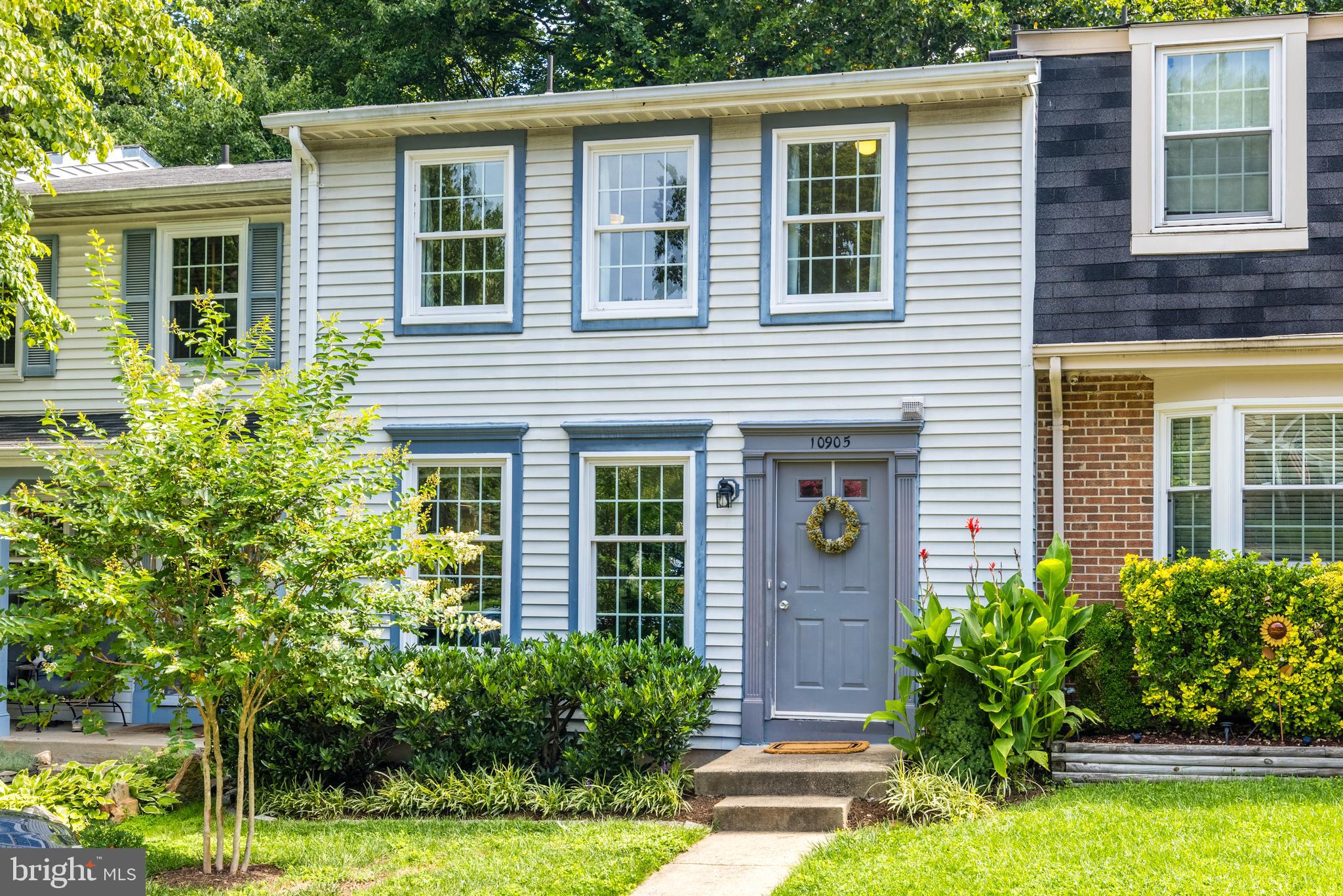 Highly Upgraded, Great Community! Tucked on a cul-de-sac in desirable Reston, backing to tranquil trees, creek and parkland, this beautiful home boasts a prime location, loads of privacy and upgrades: New roof 2024, new hot water heater 2024, renovated kitchen, newer primary bath, newer deck, new windows 2018 and more! The main level features a bright, open floor-plan, where an upgraded eat-in kitchen is open to the living and dining areas, and upgraded recessed LED lighting is featured throughout. Renovations completed in 2020, the kitchen blends contemporary style with quality appliances, in a thoughtful layout designed for the home chef. French doors invite you outside to the deck, each added new in 2019, offering an effortless setting for outdoor living, all backed by verdant tree views. Inside and out, this level offers a great flow of light and space, ideal for both entertaining and relaxing day-to-day. Upstairs, retreat to your large primary bedroom with a gorgeous, renovated primary en-suite bath.  Two well-proportioned secondary bedrooms share another full bath in the hall. The walk-out lower level features a spacious finished rec room with a wood-burning corner fireplace, plus lots of extra storage. This level also hosts the laundry area with utility sink, with washer and dryer were installed 2020. This sought-after location is easily accessible to shopping, Starbucks, and tons of great restaurants and recreation. Stroll to the Barton Hill tennis courts and tot lot right down the road, or explore the creek trail just behind the home, which takes you into the local shopping center, lakes and nature walks on the W&OD. Plus, top-rated Sunrise Valley Elementary School is only blocks away! Location, amenities, comfort and convenience - this one checks all the boxes. Don’t miss it!