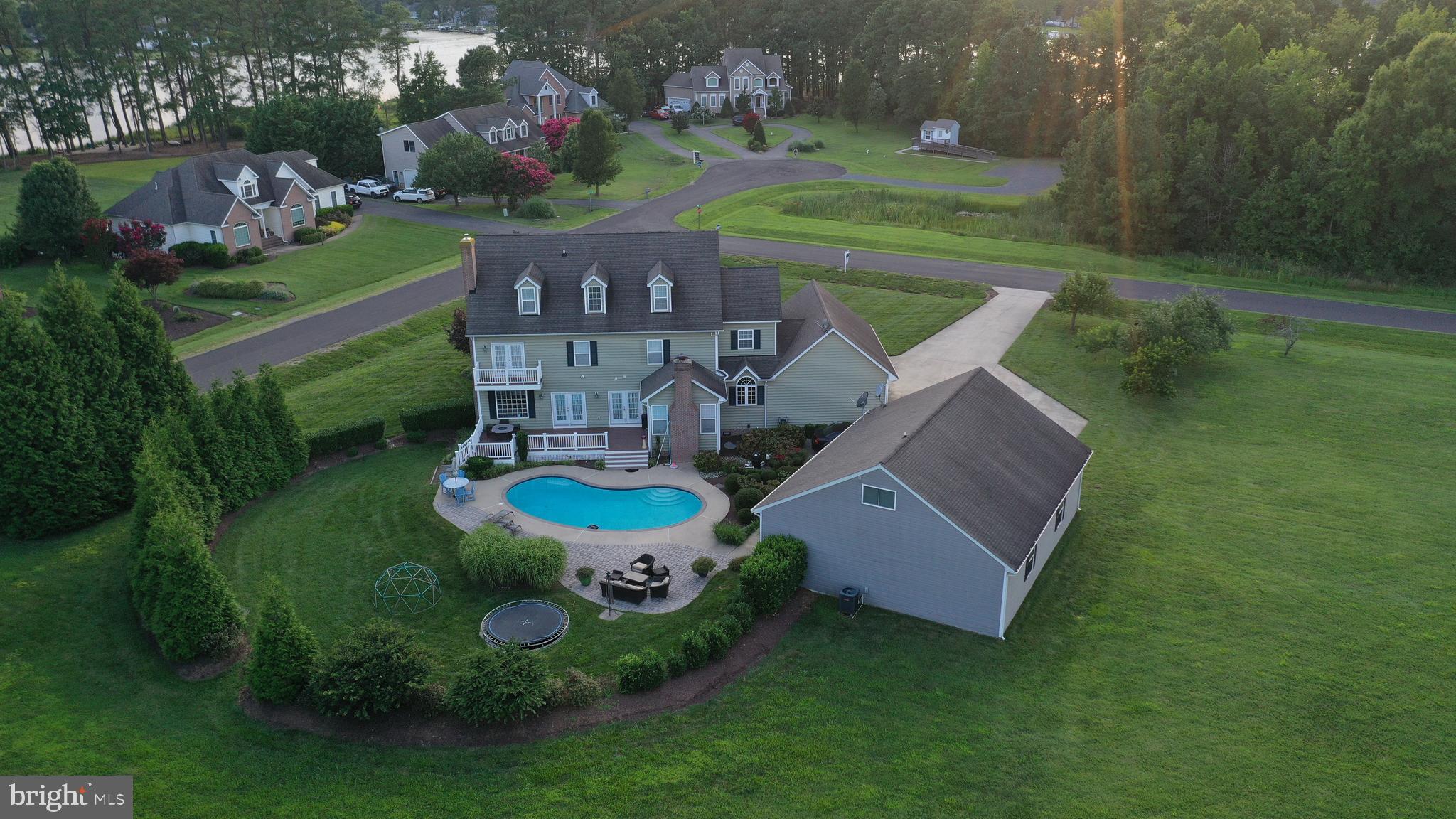 BEAUTIFUL 21 ACRE WATERFRONT ESTATE WITH OVER 400' OF WATER FRONTAGE AND SEPARATELY DEEDED DEEP WATER SLIP IS INCLUDED, SLIP #16 AT THE FAR LEFT END OF THE PIER RIGHT ACROSS THE STREET! APPROXIMATELY 6 CLEARED ACRES AND 15 WOODED ACRES. SPECTACULAR 3-STORY HOME WITH 4 LARGE BEDROOMS W/ENSUITE BATHROOMS. RECENT TOP QUALITY GOURMET KITCHEN RENOVATION W/GAS COOKTOP. IT'S AWESOME!  ATTACHED 2-CAR GARAGE AND A MONSTROUS DETACHED GARAGE WITH ROOM FOR 6 MORE CARS. PLENTY OF STORAGE. BEAUTIFUL, PRIVATE INGROUND GUNITE POOL. CALL LISTING AGENT FOR MANY MORE AMENITIES. READ HOA DOCS IN DISCLOSURES. TRY TO GIVE 1-2 DAYS SHOWING NOTICE, PLEASE.