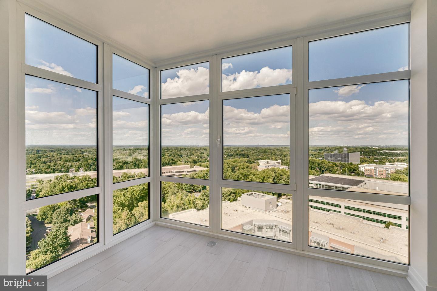 Amazing Views & Modern Updates — Penthouse-Like Living with Exceptional Amenities!

Welcome to this beautifully maintained 1-bedroom, 1-bath condominium (898 sq. ft.) located on the 16th floor of a premier high-rise residence in the heart of Tysons. This contemporary home offers an open-concept floor plan with floor-to-ceiling windows that flood the space with natural light while showcasing breathtaking panoramic views.

The thoughtfully updated interior features upgraded countertops, custom built-ins, recessed lighting, and a stylish blend of ceramic tile and luxury laminate plank flooring, creating a sleek and modern living environment.

Residents enjoy an impressive array of resort-style amenities, including:

24-hour concierge service
Fitness center and exercise room
Outdoor swimming pool
Clubroom, game room, and billiards lounge
Guest suites and meeting rooms
Secure elevator access
Assigned underground parking

Condo fees include many essential services, such as gas, water, trash removal, snow removal, and exterior building maintenance, providing exceptional value and convenience.

Ideally situated in the vibrant Tysons corridor, this residence is just minutes from premier shopping, dining, and entertainment at Tysons Galleria and Tysons Corner Center. Commuters will appreciate easy access to the Washington Metro Silver Line, major highways, and nearby retail destinations.

The location is especially attractive for professionals working at major employers, including Capital On, Booz Allen Hamilton, Freddie Mac, MITRE, Gannett, and Hilton Worldwide, as well as numerous Fortune 500 and technology companies throughout Tysons.

Whether you're a young professional, couple, first-time home buyer, or investor, this residence offers the perfect combination of luxury, convenience, and urban living in one of Northern Virginia's most sought-after locations. Don't miss this opportunity to enjoy high-rise living with spectacular views and outstanding amenities.