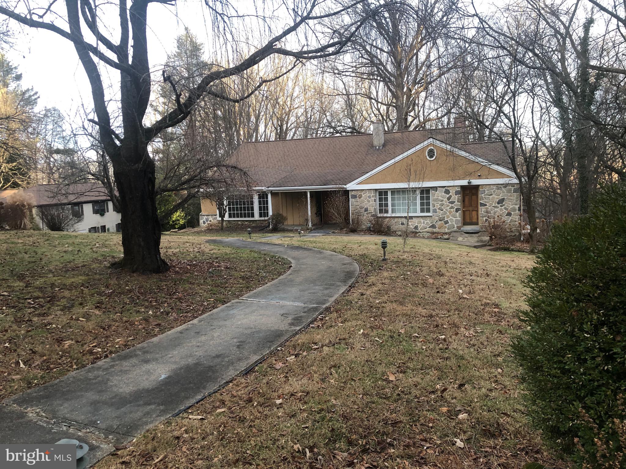 This lovely, spacious 3  level  home features 6 bedrooms, 2 full bathrooms and 1 powder room .Loads of charm nestled on close to 2 acres.Beautiful street  located in one of Lower Merion's most prestigious neighborhoods.  The rear yard is excellent for a pool, hot tub, etc. The lower(1st level)is comprised of 2 bedrooms with wall to wall carpeting, full expanded modern bathroom and a den area. The den is comprised of a  wet bar section as well as 2 brick, wood  fireplaces, doors that lead out to the rear yard  and a rear patio. There is also rear wood steps that lead to a wood deck. This area would  also make an excellent In-Law Suite. The main floor(2nd level) is comprised of a full eat in kitchen with a spacious breakfast nook. In addition, there are doors that lead to the rear deck with  steps. This main area also has a laundry room section with a washer and dryer and a second refrigerator. The laundry section also has another wood door leading to the front yard.  There is also a formal spacious dining room, spacious living room and a modern powder room. Beautiful hardwood flooring, The upper level(3rd level) is comprised of 4 bedrooms and a full modern bathroom. Ample, spacious closet space through-out the property. Small basement and a attached 2-car garage. The garage has lots of cabinet space for extra storage. Remote garage door and another door that leads to the basement. Long, spacious driveway where you can park another 4-5 cars. There is additional parking on the street. Lovely, lighted cement pathway leading from outside the main front door to the mailbox at street level. Only minutes to highways, public transportation,
the Wynnewood Train Station only minutes away, shopping , schools, supermarkets(Whole Foods, Giant, Acme), numerous eating establishments, drug stores, Fedex ,car dealers, banks, religious institutions The Philadelphia International Airport is also close by. On  lockbox. Easy to show. Owner is looking forward to an Agreement of Sale.