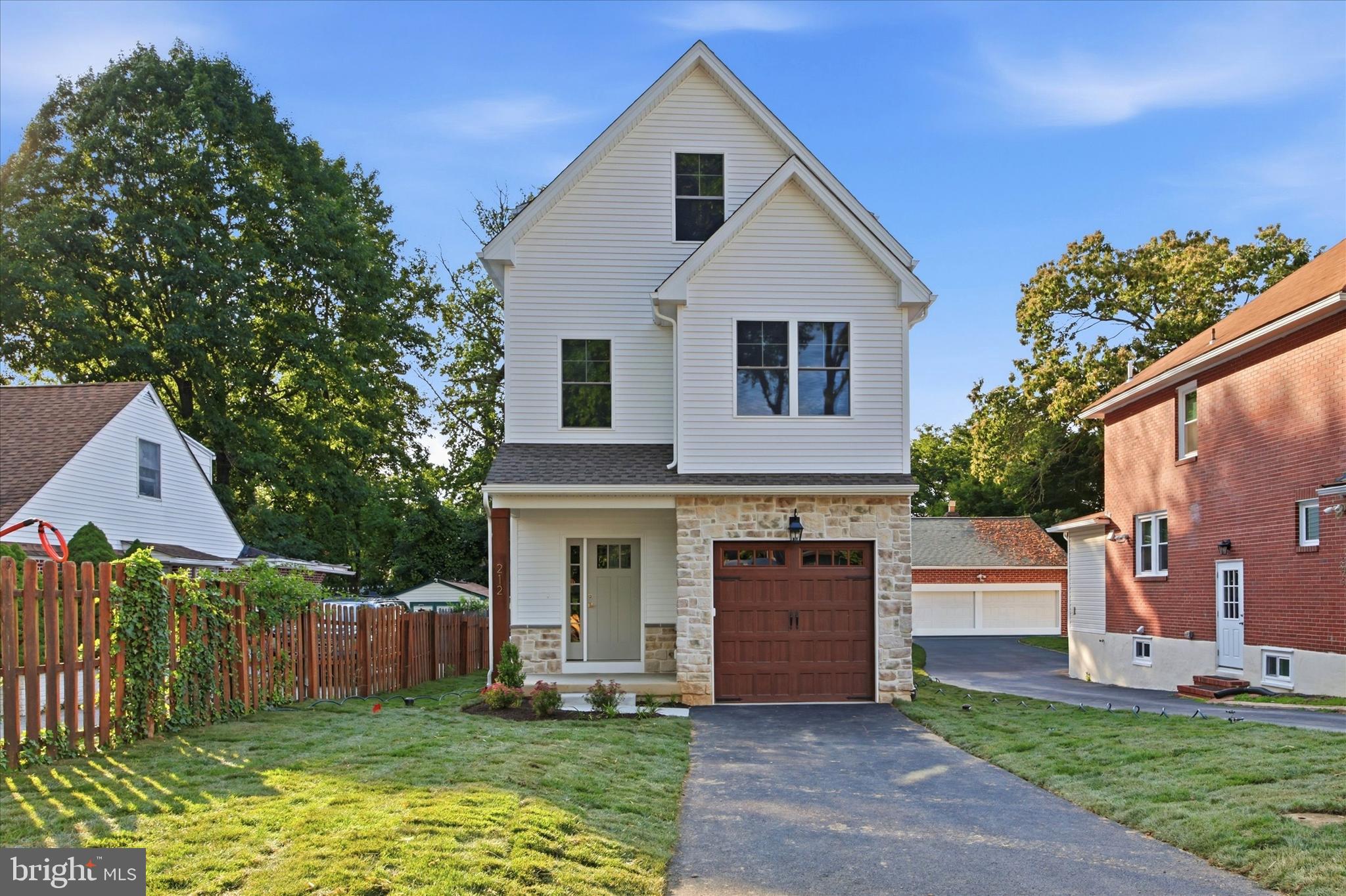 Welcome to your new home in Newtown Square, located within the highly regarded Marple Newtown School District and ready for immediate occupancy before the start of the school year. This thoughtfully designed new construction residence offers over 2,700 square feet of finished living space across four levels, featuring 5 bedrooms, 3.5 bathrooms, a finished basement, and a one-car garage. At the heart of the home is a chef’s kitchen with high-end cabinetry, GE appliances, and quartz countertops, seamlessly connecting to the dining area and a bright great room with a fireplace and double French doors—creating an inviting space for everyday living and entertaining. The second floor is anchored by a spacious owner’s suite and complemented by a generously sized secondary bedroom, a full hall bathroom, and a convenient laundry room. The third floor offers two additional bedrooms, a hall bath, and a versatile loft or playroom. The finished basement provides a large flex space, fifth bedroom or private office, and ample storage. Ideally located in the heart of Newtown Square, 212 Chestnut offers easy access to shopping and dining along West Chester Pike, Ellis Preserve Town Center, and major commuter routes. With construction now complete and move-in ready, this home presents a rare opportunity to settle in before the new school year begins while enjoying the perfect blend of suburban charm and modern convenience.