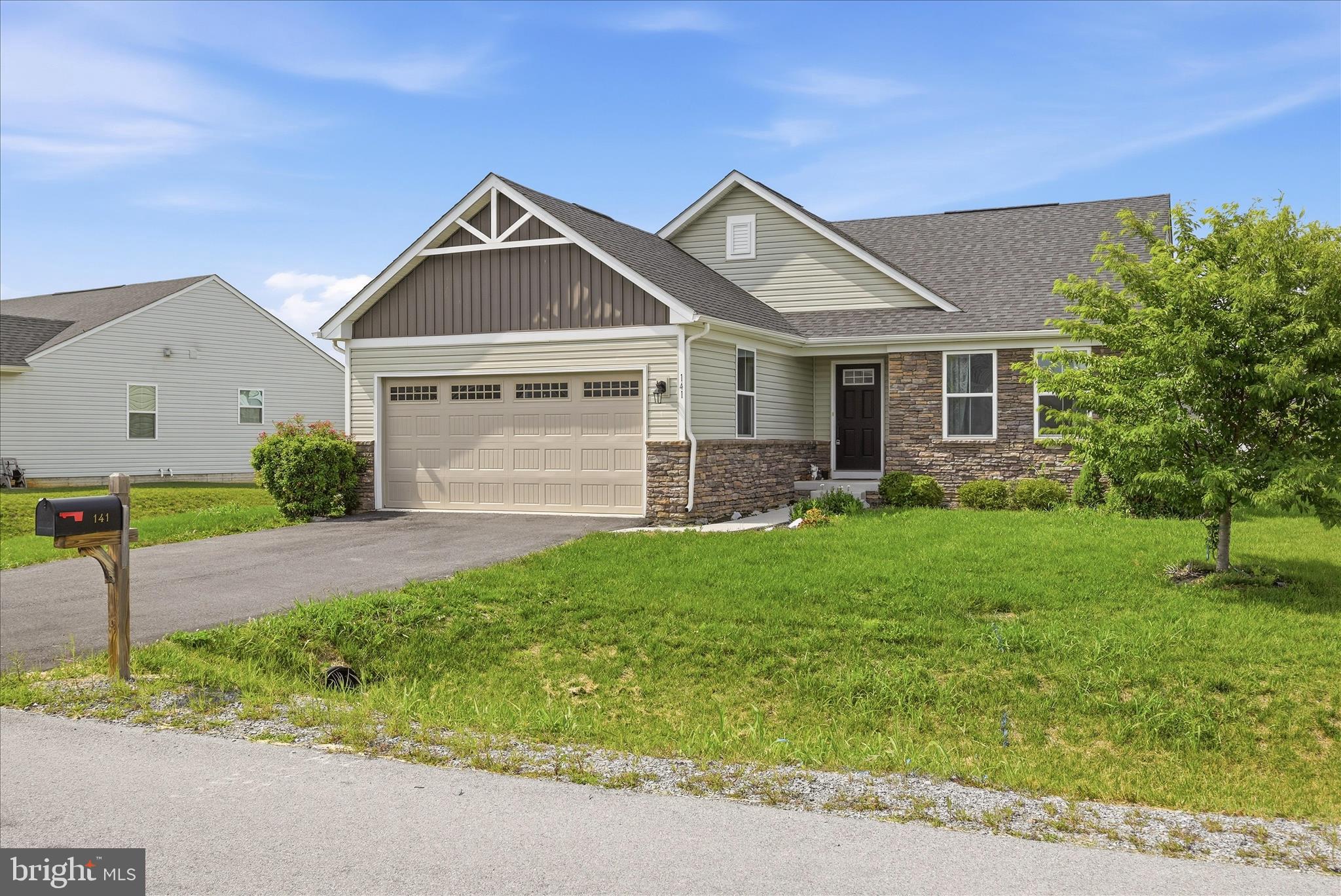 Welcome to 141 Bindweed Ct! This 3 bedroom 2 bathroom ranch style home is conveniently located in the Chandler Glen Subdivision just 20 minutes north to Martinsburg or south to downtown Winchester.  Inside the home you are greeted with a open foyer with luxury vinyl plank flooring, the two secondary bedrooms with a shared full bathroom and access to the basement and two car garage.  Further into the home is a large living room which is just off of the upgraded kitchen and dining room. The kitchen boasts granite countertops, stainless steel appliances and more. The dining room has sliding glass doors that lead you to your large backyard which backs to common area. In the back of the home you will find a nice sized laundry room with laundry hookups and the large primary bedroom. This bedroom has its own en suite bathroom with tile walk in shower and dual vanity sink along with a large walk in closet. Downstairs is a full sized unfinished basement, perfect for all of your additional storage or for future expansion. With a little TLC this home could be your next dream home. It is priced to sell so do not miss this opportunity!!