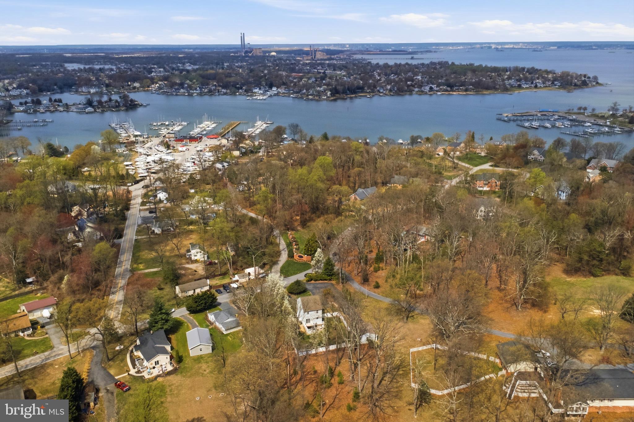 HIGHEST AND BEST DUE SUNDAY 4/12 at 6pm.    Welcome to 7717 Colonial Beach Rd, a traditional home on a private half-acre lot in Pasadena. A circular driveway leads to this quiet community near Rock Creek and the Chesapeake Bay. The main level features a spacious living room with 9’ ceilings and hardwood floors, plus a half bath and separate laundry room. The kitchen opens to a fully fenced backyard with deck, patio, fire pit, garden, and a detached 2-car garage with electric.

Upstairs offers 3 bedrooms and 2 full baths, including a primary suite with walk-in closet. The finished basement adds a large family room, play area, and storage. Conveniently located near Fort Smallwood Park, Compass Pointe Golf Course, and Mike’s waterfront dining. A great opportunity for space, privacy, and convenience!
