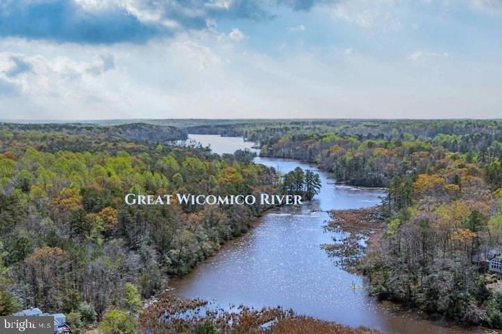 Welcome to an extraordinary opportunity in the peaceful waterfront community of Swann Harbor. This stunning 4.71-acre homesite offers approximately 300 feet of frontage on the beautiful Great Wicomico River, providing breathtaking panoramic water views and the perfect setting to build your custom dream home.

Surrounded by towering pines and mature native vegetation, this private parcel offers a rare combination of seclusion, natural beauty, and convenience. With private road access and a spacious building envelope, you'll have the freedom to design a home that embraces the spectacular riverfront setting.

Residents enjoy access to a community dock and boat launch, making it easy to spend your days boating, fishing, kayaking, canoeing, paddleboarding, or simply relaxing on the water. Whether you're searching for a peaceful weekend retreat or a year-round waterfront residence, this exceptional property offers the ideal backdrop for a lifestyle centered on nature, recreation, and tranquility.

If you've been dreaming of owning a slice of Virginia's waterfront paradise, this remarkable Great Wicomico River property is ready to bring that vision to life.  Lot 19 and 19A are included.