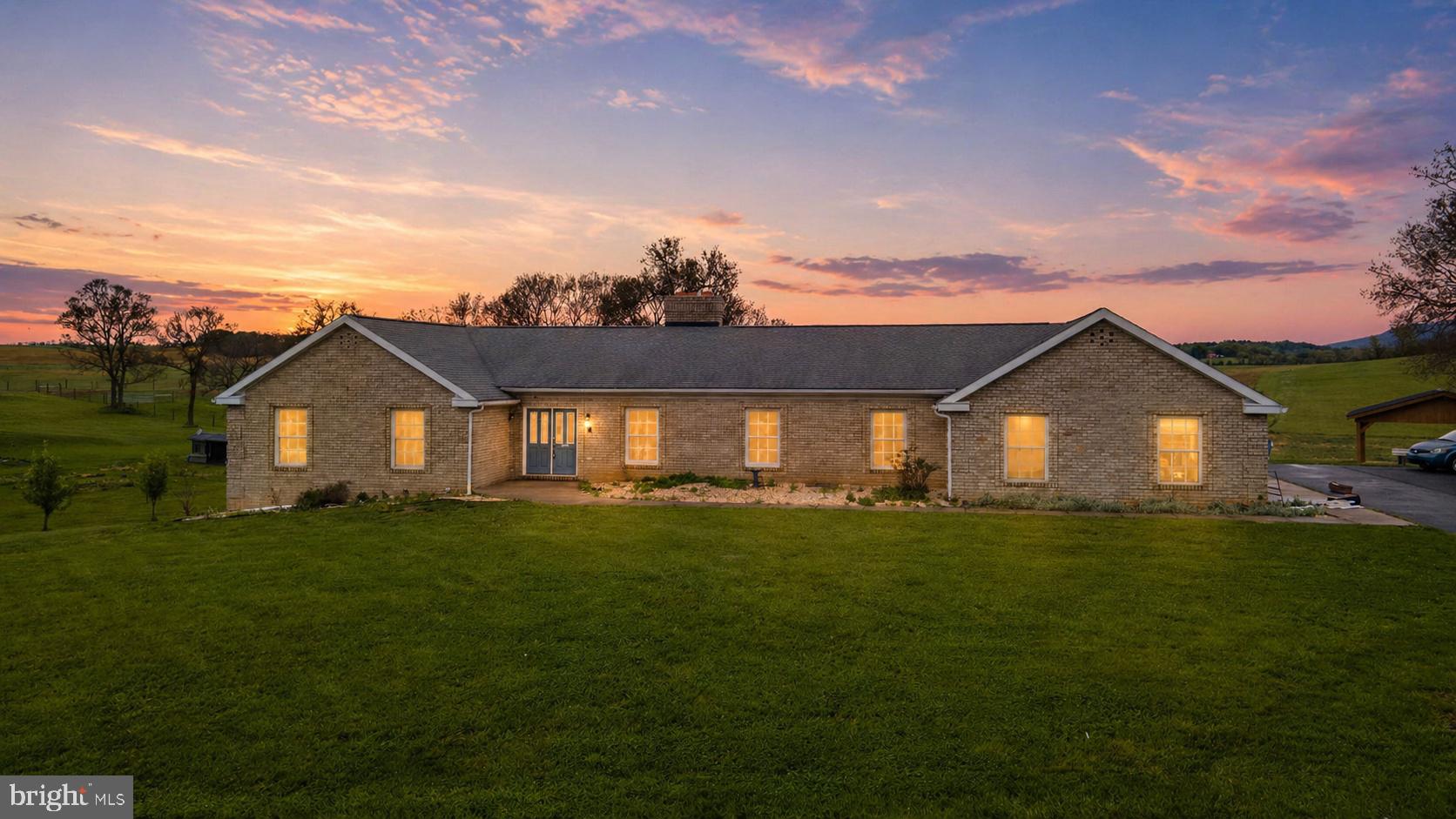 Set on a full acre backing to open farmland, this well-maintained and recently updated rancher offers a rare combination of space, flexibility, and mixed-use potential.

The main level features three bedrooms, a spacious eat-in kitchen, a dedicated dining area, and multiple living spaces including a comfortable family room and convenient laundry area. The layout provides both functionality and flow for everyday living.

Zoned for mixed use, the property is well-suited for buyers looking to operate a home-based business. The fully finished garage offers a separate, versatile space with easy access ideal for meeting clients, running a business, or converting into additional living space, a gym, or a studio.

The finished walk-out lower level expands the home’s usability with two additional bedrooms, a half bath, and a large open area suitable for recreation, guests, or extended living arrangements.

Outdoor features include a covered pavilion for entertaining, an expansive rear deck, and a private yard backing to scenic farmland, providing both space and privacy. The property is also home to several mature fruit trees, including apple, pear, and peach trees, creating a beautiful setting and the opportunity to enjoy fresh fruit right from your own backyard.

Recent updates totaling over $50,000 include a new HVAC system, refinished hardwood floors, fresh paint throughout, updated bathroom vanities and showers, and upgraded kitchen cabinetry.

A versatile property with residential comfort and business potential in a private setting.