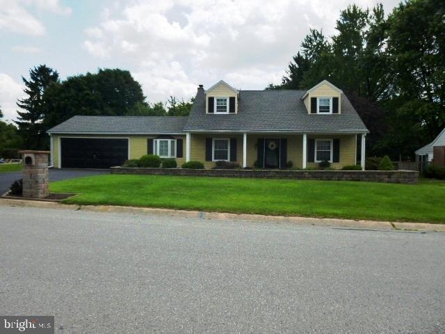 Cape Cod in a convenient location near I83 & shopping. Generously sized rooms, well maintained home. New roof, many upgrades. Gas fireplace in Family Room, large 23 x 19 covered deck for family get togethers. Private backyard. Many hardwood floors. Attractive landscaping, wrap around stone wall in front. Aluminum exterior with vinyl dormers A must see home!
