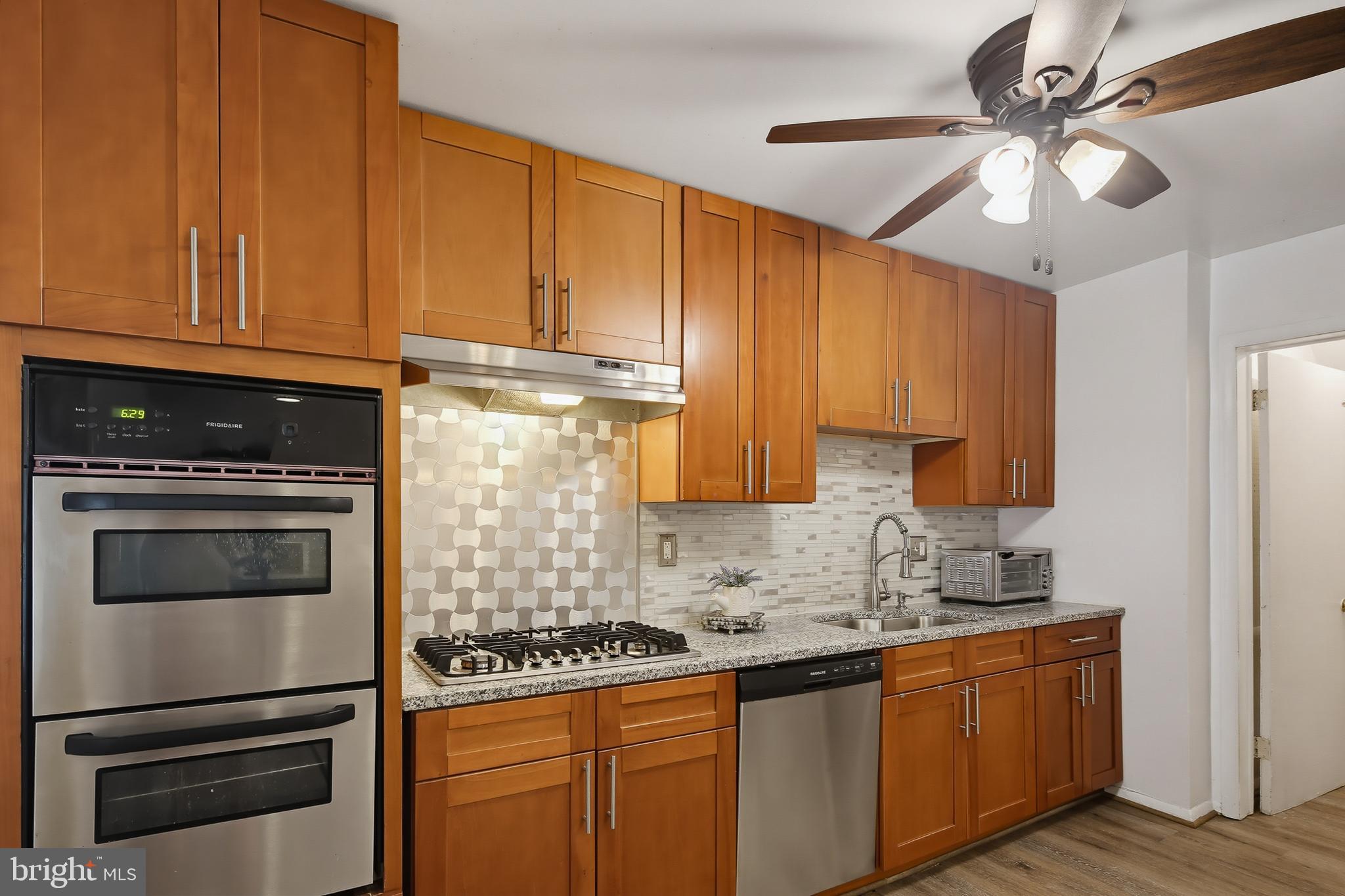 Welcome home to this freshly painted 4-bedroom, 1.5-bath townhome that offers space, comfort, and great amenities throughout. The updated chef’s kitchen is a standout feature, complete with a gas cooktop, wall oven, and broiler—perfect for preparing meals and entertaining guests.
Enjoy outdoor living all summer long in the fully fenced backyard, featuring a covered patio and an above-ground pool with a surrounding deck, creating the ideal setting for relaxation and gatherings.

Additional updates include a new hot water heater for added peace of mind. The fully finished basement expands the living space with a spacious family room and a large fourth bedroom, making it perfect for guests, a home office, or a private retreat.

With generous room sizes, modern updates, and exceptional indoor and outdoor living spaces, this move-in-ready home is one you won't want to miss!