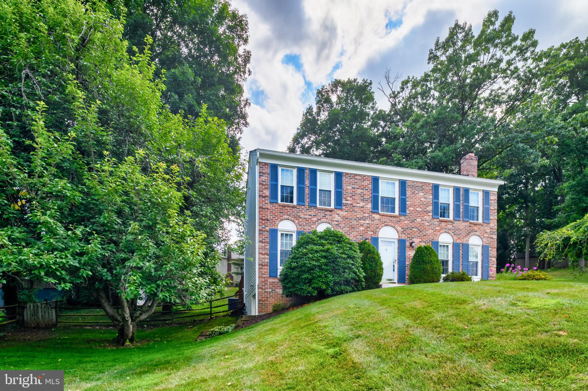 Welcome to Oklahoma Estates, where this well maintained brick front Colonial is tucked away on a peaceful cul-de-sac. Offering 4 bedrooms, 2½ baths, and a backyard designed for entertaining, this move-in ready home has been lovingly cared for by its original owners.

The beautifully updated kitchen, renovated in 2022, features quartz countertops, white cabinetry with convenient pull-out shelves, under-cabinet lighting, luxury vinyl plank flooring, and a glass-top electric range with both convection and conventional cooking options. The spacious eat-in kitchen offers ample table space, a ceiling fan, and French doors leading to the tiered deck and private pool area with a covered seating space, creating the perfect setting for summer gatherings, outdoor dining, or simply relaxing at the end of the day.

The main level also includes a cozy family room with a gas fireplace, a spacious living room, a formal dining room, and an updated powder room featuring a new vanity with a quartz countertop and updated lighting.

Upstairs, the primary suite offers a walk-in closet and private bath, while three additional generously sized bedrooms and a full hall bath provide plenty of space for family and guests.

The walk-out lower level features a large second family room or game room, along with abundant storage space and a laundry area complete with a washer, dryer, and utility sink.

Beautiful hardwood flooring extends throughout the main level and upper hallway. Additional highlights include natural gas heat and a gas water heater. Conveniently located near shopping, restaurants, and everyday amenities, this exceptional home offers comfort, thoughtful updates, and a backyard that feels like your own private vacation destination.