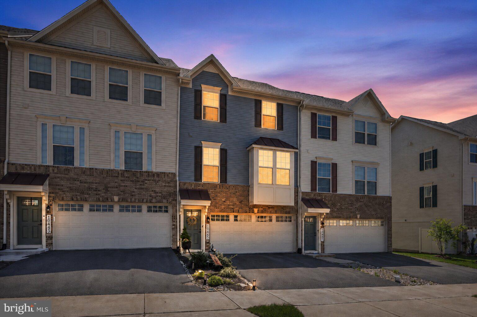 *Cinch Home Warranty Included* Move in with peace of  mind!

Welcome to the highly sought-after community of The Hamptons at Lake Linganore, packed with amenities you won't find elsewhere.

Private lakes and beaches, 4 swimming pools, 35-plus miles of trails, pickleball, tennis, volleyball, tot lots, Food Truck Tuesdays, and a community calendar that runs year-round. The Hamptons puts you inside all of it.

This upgraded townhouse is turn-key ready. The owners didn't stop at what the builder gave them. Rich LVP flooring replaced the standard finishes, custom wood accent features were added throughout, and the result is a home that reads warmer and more intentional than any other home at this pricepoint. Add in upgraded insulation in the attic for ultimate efficiency, and this home checks every box.

The kitchen anchors the main level with a large island seating four, upgraded Samsung stainless appliances, and granite countertops. The sun-filled dining area opens directly to a deck with stairs down to the backyard, keeping outdoor living within reach from the moment you walk in. A powder room rounds out the main level.

Upstairs, the owner's suite delivers a tray ceiling, recessed lighting, a double bowl vanity, a walk-in shower, and a walk-in closet with real usable depth. Two generously sized bedrooms, a full bathroom, and a dedicated laundry room complete the upper level. The finished lower level is set up for a home gym and media room, two functional spaces that don't compete with each other for square footage.

The rear deck is perfect for entertaining, grilling, and enjoying the peace and quiet of Lake Linganore.