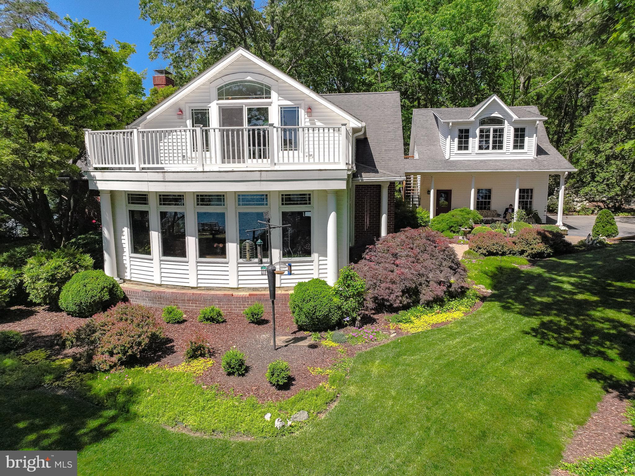 Welcome to your serene oasis where tranquility meets luxury in this magnificent waterfront
estate. This is a 6.57 acre point of land of simple bliss. Take in the wonderful views of St Johns
Creek and Solomons Harbor. This property boasts over 800+ feet of spectacular water frontage
with spectacular views from every point on the property. A professionally landscaped design
offers year-round beauty for your enjoyment. Embrace life on the water and enjoy magnificent
sunrises and sunsets. This is a turnkey vacation or year-round residence. Take a stroll to your
private pier where you will enjoy swimming, boating, fishing, jet skiing, paddle boarding,
crabbing and making lifetime memories. Step inside and see for yourself what amazing views
this home offers from every room. It boasts hardwood floors throughout with terracotta accent
floors in the kitchen and a most impressive great room. Attention to detail shows in every aspect.
When entertaining you will certainly enjoy showing off the unbelievable 180 degree views from
the great room. Three spacious bedrooms in the main house are found on the main level. The
owner’s suite will also impress you with more spectacular views and a balcony that overlooks the
entire property and water frontage. When guests arrive down the private drive, their
accommodations will also impress. A full suite awaits for overnight visits and expect they will
not want to leave. The experience of this lifestyle awaits.