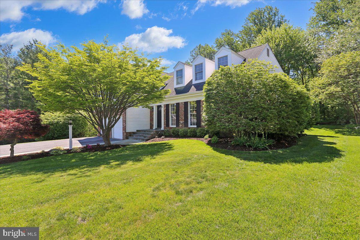 Major Price Adjustment! This is the kind of home buyers hope to find...! Beautifully cared for, full of charm, and ready for its next chapter. Come see it in person, and you'll understand why it stands apart from the competition.

Tucked away on a quiet cul-de-sac surrounded by mature trees and thoughtfully curated landscaping, this beautifully updated home blends timeless charm with elevated modern comfort. From the moment you arrive, you’ll appreciate the impressive curb appeal featuring updated front landscaping, a welcoming walkway and steps, expanded driveway, and additional gravel parking pad, all contributing to the home’s warm and polished presence.

Inside, sun-filled living spaces and a flowing layout create an atmosphere that feels both elegant and comfortable. Warm hardwood floors, spacious gathering areas, and thoughtful design touches throughout make the home equally suited for everyday living and entertaining. The beautifully remodeled kitchen serves as the heart of the home, offering rich cabinetry, granite countertops, stainless steel appliances, expansive island seating, and a cozy breakfast area overlooking the peaceful backyard. Nearby, the family room is anchored by a stunning high-end Mendota gas fireplace insert, creating the perfect setting for quiet evenings or gathering with family and friends.

All three bathrooms have been tastefully renovated with premium Porcelanosa Spanish tile and refined finishes throughout. The luxurious primary bath feels like a private retreat, showcasing a freestanding soaking tub, oversized glass shower, and spa-inspired details that bring a sense of relaxation and sophistication to everyday life.

Outdoor living is equally impressive. The expansive rear deck and beautifully appointed gazebo create an ideal extension of the home — perfect for summer dinners, morning coffee, or simply unwinding while enjoying the private tree-lined backyard setting. Every improvement has been made with care, creating a home that feels effortlessly maintained, thoughtfully upgraded, and truly special.

Additional items conveying with the sale include three deck sofas and a coffee table, a garage safe, a garage refrigerator, and a Weber grill (Hooked up to the natural gas line). TVs convey with the exception of the basement television. A rare opportunity to own a meticulously maintained home offering timeless style, meaningful updates, and a setting that feels both peaceful and inviting.