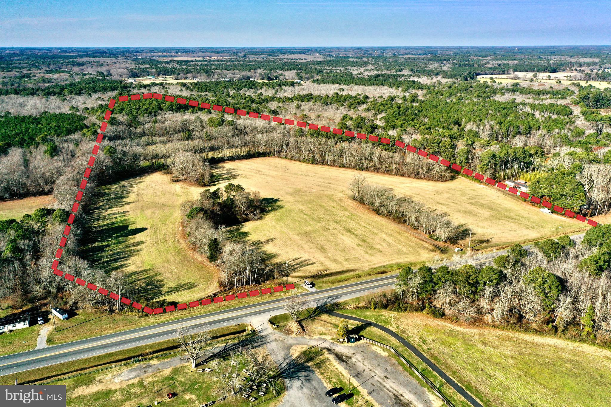 29.47 ACRES, Prime Location minutes from West Ocean City, many possible uses under the current A-2 Zoning, approximately 745 Feet of road footage on Route 611. Several Conceptual plans have been designed for this site. A preliminary design is available for a Campground / RV Park with a 128 Sites, comprised of 42 Pull Thru RV Sites, 54 Back-in RV Sites, and 32 Park Models, which would require approximately 44 EDUs allocation and approval from Worcester County Planning and Zoning. Currently there is one approved Perk site on the property. Other possible uses would include Boat and RV Storage buildings ( no EDUs required ),Contractor Shops,  Wineries / Brewery, Agritainment facilities, Veterinary Clinics, Commercial Dog Kennels, Residential Subdivision, and many more possibilities, see the Survey and Zoning code in the Document Section. This Property is mostly cleared and has been farmed for the past 30 plus years, it is located a few miles south of the West Ocean City Hub of fine Restaurants and Sunset Marina. Additionally, the Ocean City Airport and Assateague Island are close by for your convenience. Property has been fully surveyed and a wetland Delineation has been completed, showing mostly uplands. All Potential uses should be verified through the Worcester County Planning and Zoning Offices. No Conservation easements exist on the property. This property is a great opportunity in highly desirable location.