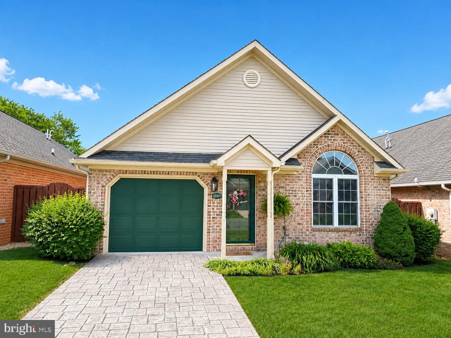 Welcome to easy living in the highly desirable Kings Crest community! This beautifully maintained brick villa offers the perfect blend of comfort, convenience, and low-maintenance living in one of Hagerstown's most sought-after locations. Ideally situated just minutes from Meritus Medical Center, Robinwood Medical Center, Hagerstown Community College, Black Rock Golf Course, shopping, dining, regional parks, and Interstates 70 and 81, you'll love having everything you need right at your fingertips. Step inside to discover a bright, sunny open floor plan filled with natural light. The spacious living room opens to a beautifully updated kitchen featuring stunning quartz countertops, gas cooking, abundant cabinet and counter space, and all appliances conveying. The adjoining dining area is highlighted by a large window overlooking the rear yard, creating the perfect setting for everyday living and entertaining alike. The main level offers two spacious bedrooms and two beautifully updated full baths, including a comfortable primary suite, as well as convenient main-level laundry hookups. Upstairs, you'll find a generous loft-style third bedroom that also provides excellent flexibility for a home office, fitness room, hobby space, or guest retreat. Additional storage space upstairs ensures plenty of room for seasonal items and extras. Outdoor living is equally impressive with a private side deck complete with awning, offering the perfect space for relaxing or entertaining while enjoying peaceful privacy. The covered rear porch overlooks wide open green space and scenic views, creating a wonderful place to enjoy your morning coffee or unwind at the end of the day. Additional highlights include an attached one-car garage, heated driveway, brand-new smart ceiling fans, efficient natural gas heat and hot water, low county taxes, and numerous thoughtful updates throughout. The HOA handles lawn mowing, mulching, and trash service, allowing you to spend more time enjoying life and less time on home maintenance. Rarely does a home offer this combination of updates, flexible living space, privacy, convenience, and carefree living. Don't miss your opportunity to call Kings Crest home!