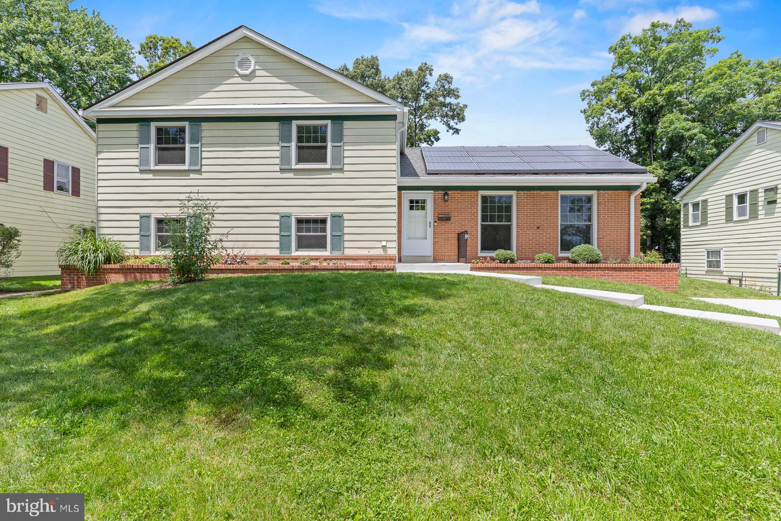 Welcome home to this spacious and beautifully updated 4-bedroom, 2.5-bath split-level residence nestled in the desirable Bedford community of Laurel. Offering a versatile floor plan and multiple living spaces, this home is designed for comfortable everyday living and effortless entertaining.

The main level features a bright and inviting living room, a formal dining area, and a gorgeous bright eat-in kitchen with ample cabinet and counter space and updated appliances. Upstairs, you'll find generously sized bedrooms, including a primary suite with a private full bath and it's own huge covered deck, along with 3 additional bedrooms and a full hall bath.

The lower level provides a large family room perfect for gatherings, movie nights, or a home office setup, along with a convenient half bath and additional storage space. In addition, there is another sweet family room featuring a wood burning fireplace and access to your backyard patio. Large windows throughout the home fill the interior with natural light, creating a warm and welcoming atmosphere.

Outside, enjoy a spacious yard ideal for relaxing, gardening, or hosting outdoor events. Conveniently located near parks, shopping, dining, major commuter routes, and all that Laurel has to offer, this home combines suburban tranquility with everyday convenience. Residents enjoy the neighborhood's sidewalks for evening strolls and easy access to Bedford Park, with basketball and tennis courts, open green space, and scenic wooded walking trails.

A standout feature of this property is its solar panel system, offering potential energy savings and added efficiency for today's environmentally conscious homeowner

Ideally located close to the Baltimore-Washington Parkway, I-95, I-495, and the Intercounty Connector, as well as Laurel’s historic Main Street district. 

Don't miss this opportunity to own a beautiful home in one of Laurel's established neighborhoods. Schedule your private tour today!