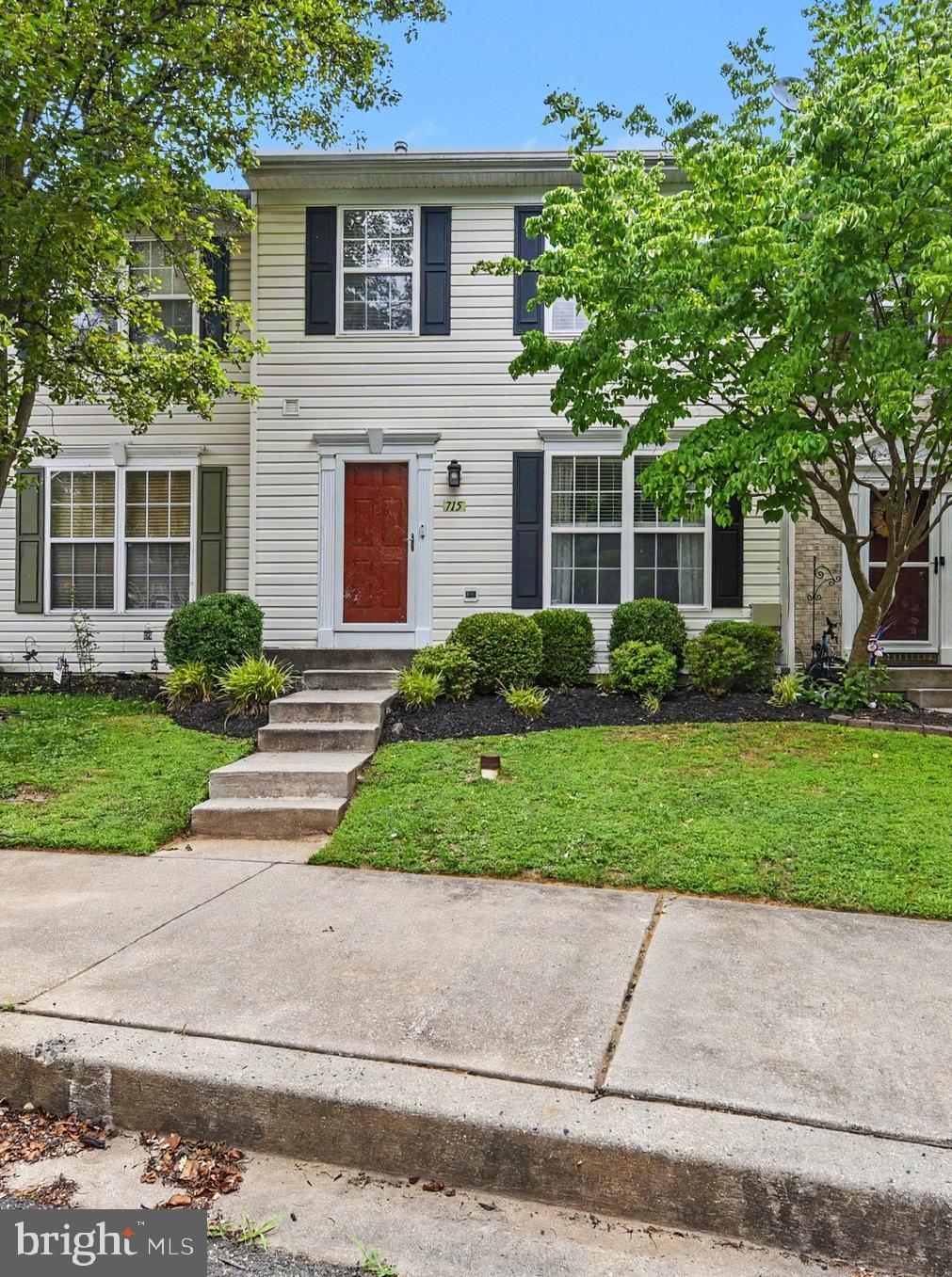 Welcome home to this beautifully maintained 3-bedroom, 2.5-bath townhome offering space, flexibility, and modern updates throughout. The main level features new luxury vinyl plank flooring, a spacious kitchen with center island, separate dining area, and a desirable bump-out that creates the perfect sitting room, home office, or playroom.

Upstairs, you'll find three comfortable bedrooms, including a spacious primary suite with private bath.

The finished walk-out lower level offers incredible potential with a full bathroom rough-in already in place. Whether you're looking to create additional living space, a recreation room, or a potential 4th bedroom with its own private entrance, the possibilities are endless.

Step outside to enjoy the newly built deck overlooking a fully fenced backyard—ideal for entertaining, pets, or outdoor play.

Conveniently located and move-in ready, this home combines comfort, functionality, and room to grow.