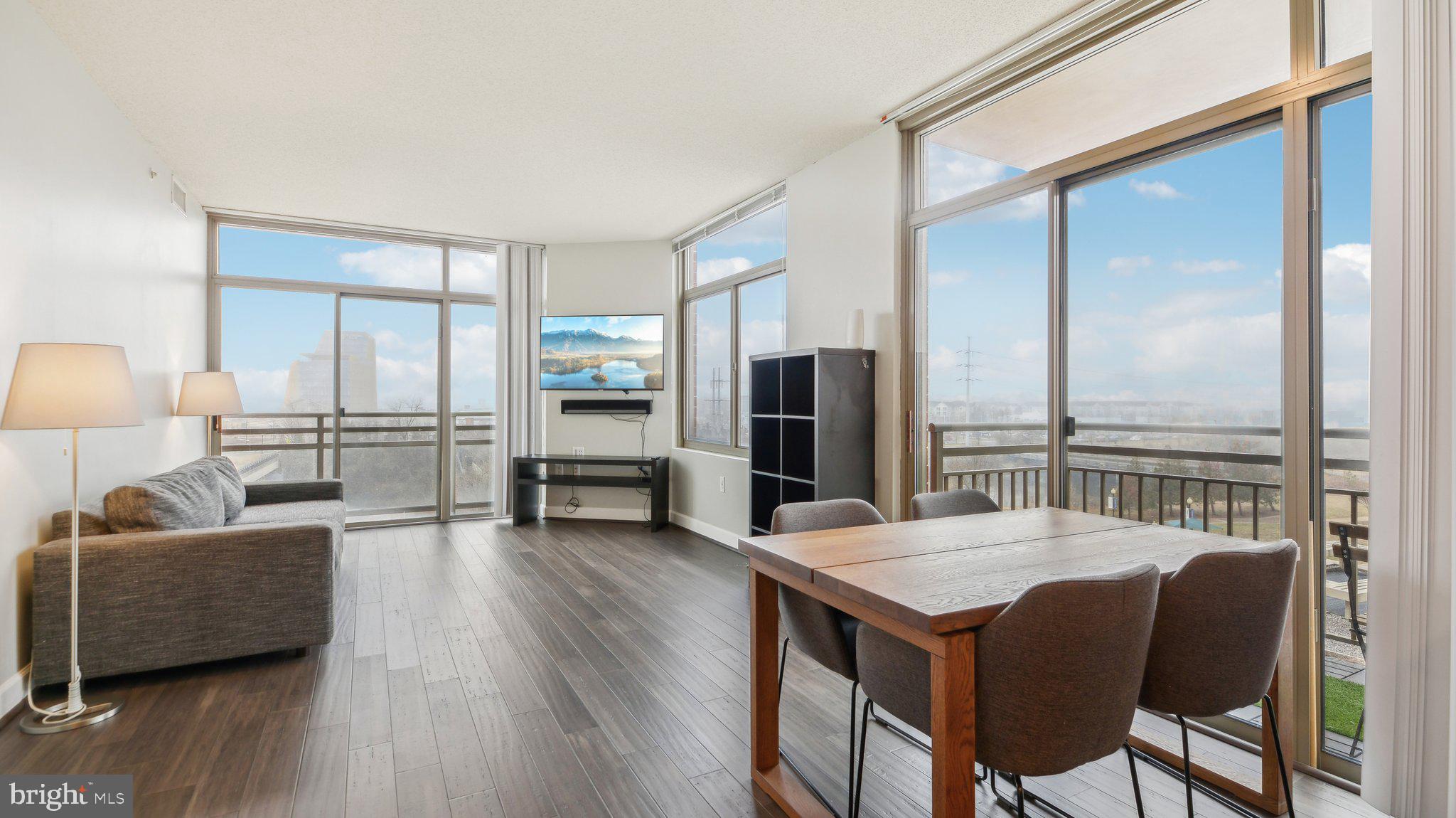 Experience stunning views from this light-filled corner unit at 3650 S Glebe Rd #557! This beautifully updated condo boasts two private balconies overlooking the pool, bamboo hardwood flooring, a full-size Whirlpool washer/dryer, and custom Elfa closets. The space feels open with the kitchen and living areas flowing seamlessly together. The kitchen is well equipped with ample cabinetry, stainless steel appliances, and recessed lighting. The building offers premium amenities, including a 24-hour concierge, fitness center, swimming pool, indoor garage parking, and ample storage. Convenience is unmatched with a Harris Teeter grocery store and retail shopping on the main level. Commuters will appreciate the immediate access to Metrobus stops at the building, the nearby Capital Bikeshare station, and proximity to key transit hubs: just 0.4 miles to the new Potomac Yard Metro station, 0.8 miles to Crystal City Metro and Pentagon City Fashion Center, and only 1.8 miles to Ronald Reagan Washington National Airport. Outdoor enthusiasts will love the easy access to close by scenic trails. Enjoy a vibrant urban lifestyle with shopping, dining, parks, and cultural attractions all within close proximity.