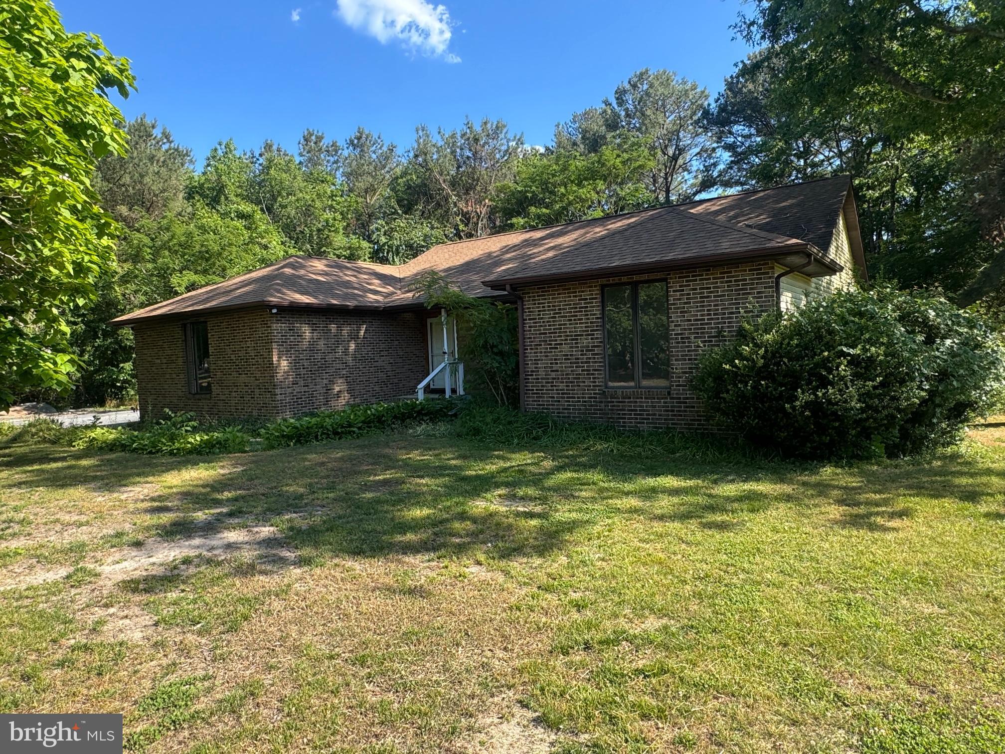 Opportunity awaits with this 4-bedroom, 3-bath brick rancher featuring an attached garage and located on a generous lot of nearly one acre. No HOA! Plenty of space inside and out to make this property your own. Home has been professionally cleaned by Servpro with documents uploaded.  Sold as-is; conventional financing or cash buyers only.