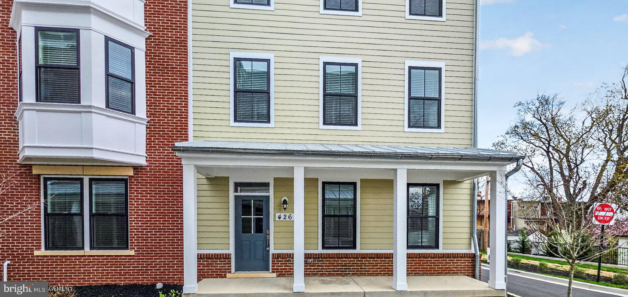 Nestled in the heart of Downtown Frederick, this exquisite new construction townhouse embodies the perfect blend of modern luxury and timeless elegance. Completed in 2025, this end-of-row Colonial-style residence is designed for those who appreciate high-end living and a vibrant community atmosphere. As you step inside, you are greeted by an inviting ambiance that flows seamlessly throughout the spacious layout. With four generously sized bedrooms and three and a half bathrooms, this home offers ample space for relaxation and entertainment. The heart of the home features a cozy fireplace, perfect for creating warm memories during chilly evenings. Crafted with meticulous attention to detail, the exterior showcases a classic brick façade that exudes sophistication. The attached two-car garage provides convenience and security, while the beautifully maintained common areas are taken care of by the association, allowing you to enjoy a low-maintenance lifestyle. The property boasts an excellent condition, ensuring that every corner reflects quality craftsmanship and modern amenities. The thoughtful design includes expansive living areas that invite natural light, creating a warm and welcoming atmosphere. Imagine hosting gatherings in your stylish living room or enjoying quiet moments in your private spaces. The association takes care of essential services such as lawn maintenance and snow removal, allowing you to focus on what truly matters-enjoying your home and the vibrant lifestyle that Downtown Frederick offers. Explore local shops, fine dining, and cultural attractions just moments away, making every day an opportunity for adventure. This residence is not just a home; it's a lifestyle choice that embraces comfort, elegance, and community. Experience the joy of living in a space that reflects your aspirations and offers the perfect backdrop for your life's moments. Don't miss the chance to make this luxurious townhouse your own and indulge in the exclusive lifestyle it provides.