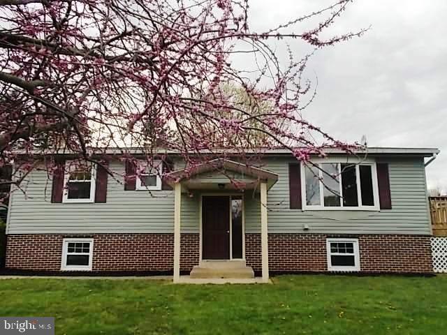 The ?legwork? is complete! 100% Financing available to qualified buyers! Wood beam cathedral ceilings accentuate living area & new kitchen all w/ new fixtures, modern lighting & cabinets  (ready for your personal touch of finish).New Flooring, bath, & even exterior siding?. WHO *kNEW*?!. Leisure living awaits from large deck & playful yard. PLUS, ready to finish lower level! Be in b4 school!