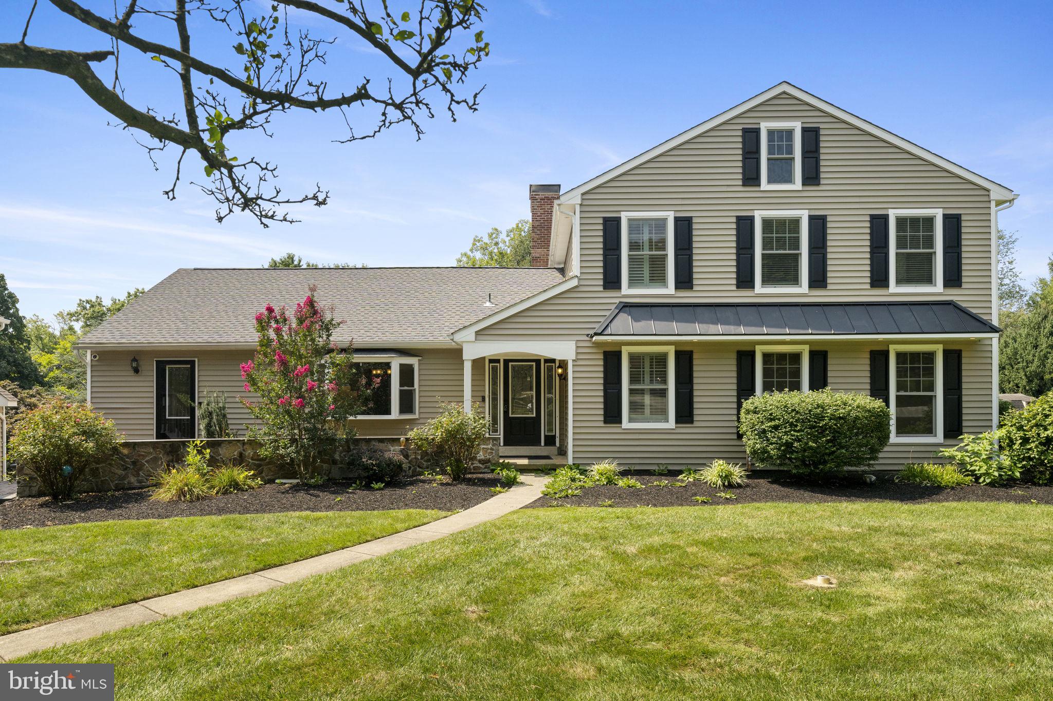 Welcome to 1 Rosewood Circle! This updated home on a quiet cul de sac in Willistown Township in award-winning Great Valley School District is ready for its next adventure! Enter the foyer and notice the warm hardwood floors extending through the whole first floor. On your right is the formal living room with an elegant, coffered ceiling and wainscoting, recessed lighting, custom built-ins and ample windows overlooking the front yard. On your left is the dining room with a vaulted ceiling, wainscoting and a charming bay window. There is a bar with quartz countertop and backsplash, beverage refrigerator and display cabinets that’s perfect for entertaining. From the dining room, up a short flight of stairs is a large, finished storage area with built-in shelving for storing extra tableware, kitchen appliances or even holiday decorations. The dining room opens to the updated chef’s kitchen with quartz countertops, white soft close cabinets, an oversized island with plenty of seating and upgraded stainless steel Bosch appliances including a professional gas range and hood. Off of the kitchen, taking full advantage of the view of the backyard is the family room with a coffered ceiling and wainscoting, recessed lighting and wood burning fireplace with shiplap surround. French doors lead out to the wood deck with stairs down to the paver patio and backyard. Down the hall, you’ll find a bright, comfortable bedroom with crown molding, recessed lighting and a walk-in closet with a professional storage system. The attached full bathroom includes an oversized vanity with marble countertop and a step-in shower with frameless glass enclosure and tile surround. Through the bathroom, you’ll find a second bedroom with crown molding, recessed lights and custom plantation shutters. The first floor is completed by the conveniently located laundry room and the half bathroom with a single vanity with marble countertop. Upstairs are two additional bedrooms including the spacious primary suite boasting hardwood floors, crown molding, recessed lighting and two walk-in closets each with professional storage systems. The private en suite bathroom includes a double vanity with quartz countertops, marble tile floor, custom storage cabinets, large step-in shower with frameless glass enclosure and marble surround with insets. The junior suite with hardwood floors and a walk-in closet has its own private bathroom with a single vanity with marble countertops, tub/shower combination with glass enclosure and tile surround. Don’t miss the finished walkout basement with a cozy wood burning fireplace with a brick surround, a full bathroom plus a bonus room that would be a great home gym, craft room or home office. The detached two-car garage includes a large rec room on the second floor with cabinets, granite countertops and a beverage refrigerator which is a great opportunity to host sports watch parties and movie nights! While this home enjoys a quiet street in desirable Upper Stonehenge, a neighborhood great for walking, it’s located just minutes from Malvern Borough’s shops, restaurants and public transportation. It also has easy access to Rte 202 and the PA Turnpike plus numerous parks and the Chester Valley Trail. Don’t miss this one!