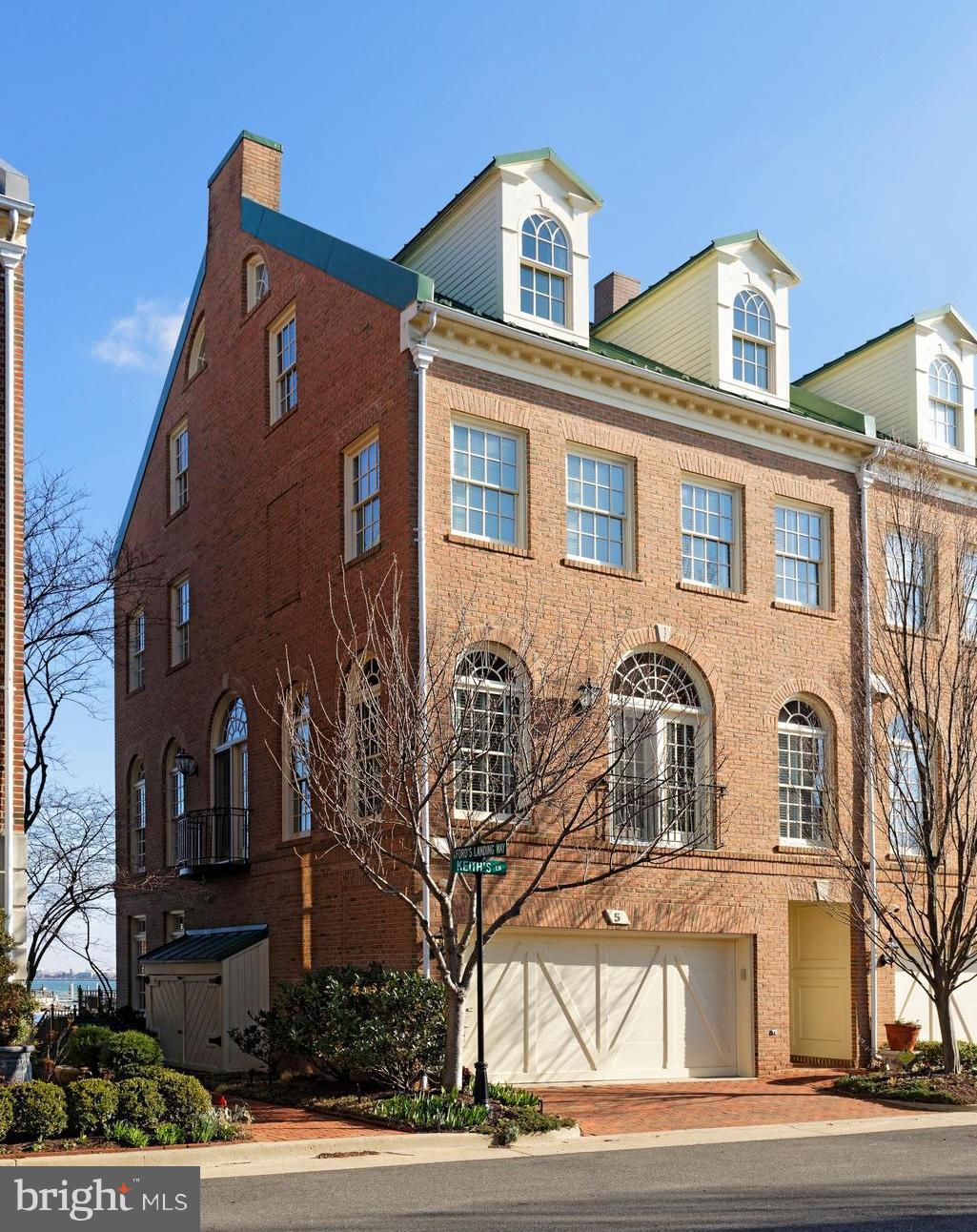 Stunning waterfront Fords Landing end townhouse with tall windows and incredible views from every level!  High ceilings, hardwood floors, family room with wet bar opening to riverfront terrace.  Sculptured marble fireplace mantels, luxurious master suite with cherry paneled dressing room, alabaster chandelier and sconces,  4 BR, 3 full and 2 half renovated baths, 2 car garage. Pristine condition!