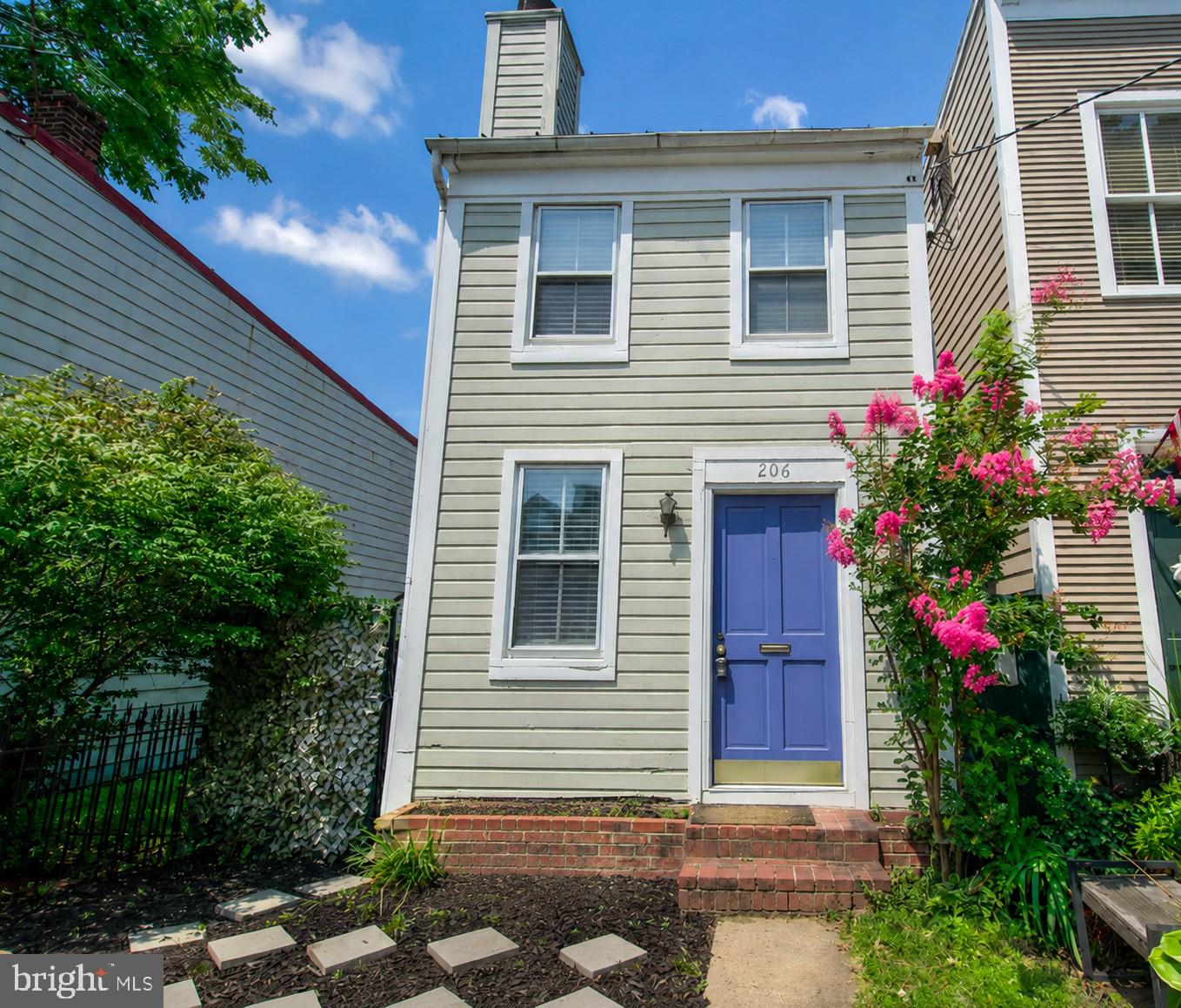 Welcome to 206 N Payne Street, a rare opportunity in the heart of Old Town Alexandria's highly desirable Parker Gray Historic District. Whether you're looking to renovate, expand, or build your dream home, the true value here is in the oversized lot and endless potential this property offers.

As an end unit with a deep backyard, there's incredible space to create a substantial addition while still maintaining plenty of outdoor living space. The property also includes a separate storage building, providing valuable extra storage or workshop space.

The existing home is full of charm and has been freshly updated with neutral paint and carpet, making it comfortable to enjoy while you plan your vision. The cozy kitchen opens to the living area, and the expansive backyard offers endless possibilities for entertaining, along with the dual decks overlooking your back yard which is a perfect space for gardening, or future expansion.

Location is everything, and this one simply can't be beat. Enjoy the rich history, walkability, and small town feel that make Old Town Alexandria so special. You're just blocks from King Street's restaurants, boutiques, coffee shops, and nightlife, with easy access to the Braddock Road and King Street Metro stations. Commuters will appreciate the quick drive to Washington, DC, Amazon HQ2, National Landing, Reagan National Airport, the Pentagon, the GW Parkway, and I-495.

Opportunities like this are becoming increasingly rare. Whether you're an investor, builder, or buyer looking to create your forever home, 206 N Payne Street offers exceptional potential in one of Northern Virginia's most sought after neighborhoods.