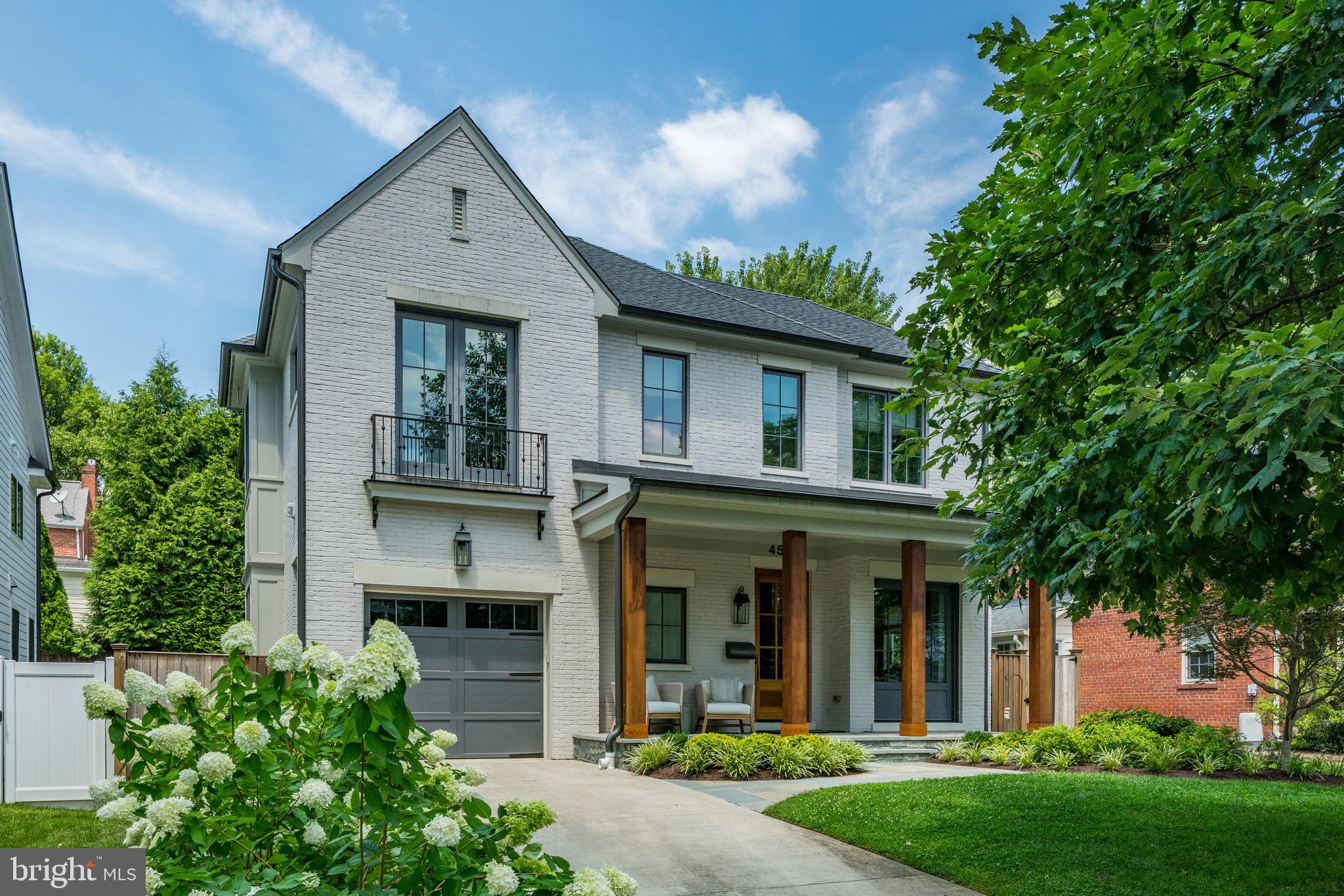 Stunning custom home completed in 2016 in partnership with Douglas Construction Group, Studio Z Design and Erica Burns Interiors. Every detail is stunning - - 10 ft ceilings, Urban Electric lighting, custom closets and built-ins, and tasteful finishes throughout from tile and hardware selections to custom window treatments. The main level features a bright, open concept family room, kitchen and dining area, as well as a private home office. The upper level has four bedrooms and three full bathrooms, inclusive of a luxurious primary suite. The beautifully finished lower level boasts a recreation room, second kitchen and guest suite.  Covered front and rear porches, a firepit and attached garage complete this exquisite home just steps from Downtown Bethesda.