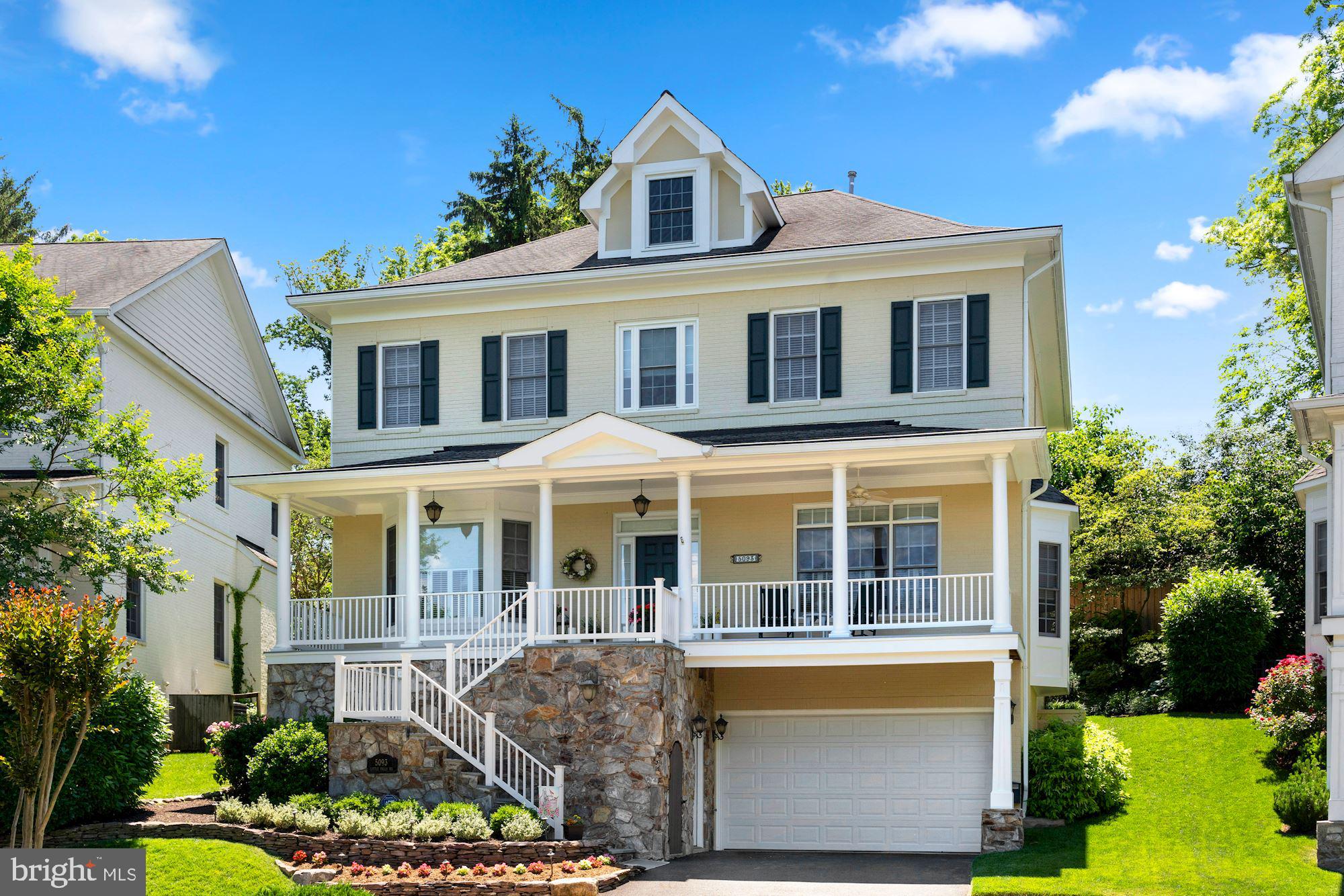 Welcome to 5093 Little Falls Court. This spacious all brick and stone colonial style home is located on a private cul-de-sac in the quaint and prestigious neighborhood of Little Falls Court. The original owners and current sellers purchased this home directly from the developer, The Barrett Companies, preconstruction and customized a majority of the finished details including the full wood paneled cab elevator, making this property truly one of a kind.  As you walk up the stone steps, you are greeted by a large traditional covered front porch with richly detailed wood pillars. Upon entering the foyer on the main level, you will be in awe of the amount of volume and space created by the ten-foot ceiling height and open floorplan. The front of the home offers a large fifteen foot by thirteen-foot library with glass French doors which allow just the right amount of privacy. Additionally, located in the front of the home is a spacious formal living room that opens to the formal dining room, creating a seamless flow for formal and nonformal entertaining alike. The formal dining room can comfortably fit an eight-person dining table and is complete with an oversized bay window. The family room, which includes a wood burning fireplace, offers a completely open floor plan. Two low dividing walls help define the family room while offering direct sightlines into the breakfast nook, gourmet kitchen and even the formal dining room.  Enjoy cooking in a gourmet kitchen with a six-burner gas stove and extended granite island.  This gives way to a cozy breakfast nook and bay window overlooking an exquisite and lush private garden. The outdoor space provides the perfect setting for either dining al-fresco or enjoying the peace and quiet in your own private oasis.   Take the stairs or ride in the elevator to the second level,  Which provides four bedrooms, three full bathrooms, nine-foot ceilings and a possible second laundry room, stubbed with a water hookup. Each bedroom is generously proportioned and hosts an abundance of natural light. The primary bedroom is nothing short of spectacular with four large windows, a gas fireplace, his and her closets and an exquisite en-suite master bathroom. The third floor remains unfinished and is currently being used for storage. However, this space could be finished as either a legal bedroom with en-suite bathroom or an upper level loft area with a full bathroom.   The lowest level of the property features a spacious twenty by nineteen-foot recreation room with nine-foot ceilings, full wet bar, gas fireplace, legal fifth bedroom and full bathroom. This lower level also furnishes the utility room, laundry room and offers access to the two-car garage and elevator.  **VIRTURAL TOUR** http://spws.homevisit.com/3D.cshtml?hvID=298890&modelID=vaXWM8YWjLg