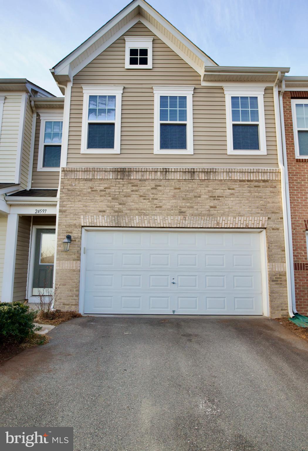 Beautiful two car garage townhome with 3 bedrooms and 2.5 bathrooms. Hardwood floor throughout main level. Kitchen with stainless still appliances and granite countertops.  Upper level features a laundry chute, a master bedroom with master bath, a second and third bedrooms sharing the hall full bath.  Very convenient location in a highly sought Stone Ridge community with easy access walking distance to Stone Ridge Shopping Center, Gum Spring Library and a Clubhouse with pool, exercise room, tennis courts, basketball courts, and so much more. Close to Rt 50, Rt 28, and Dulles Airport.