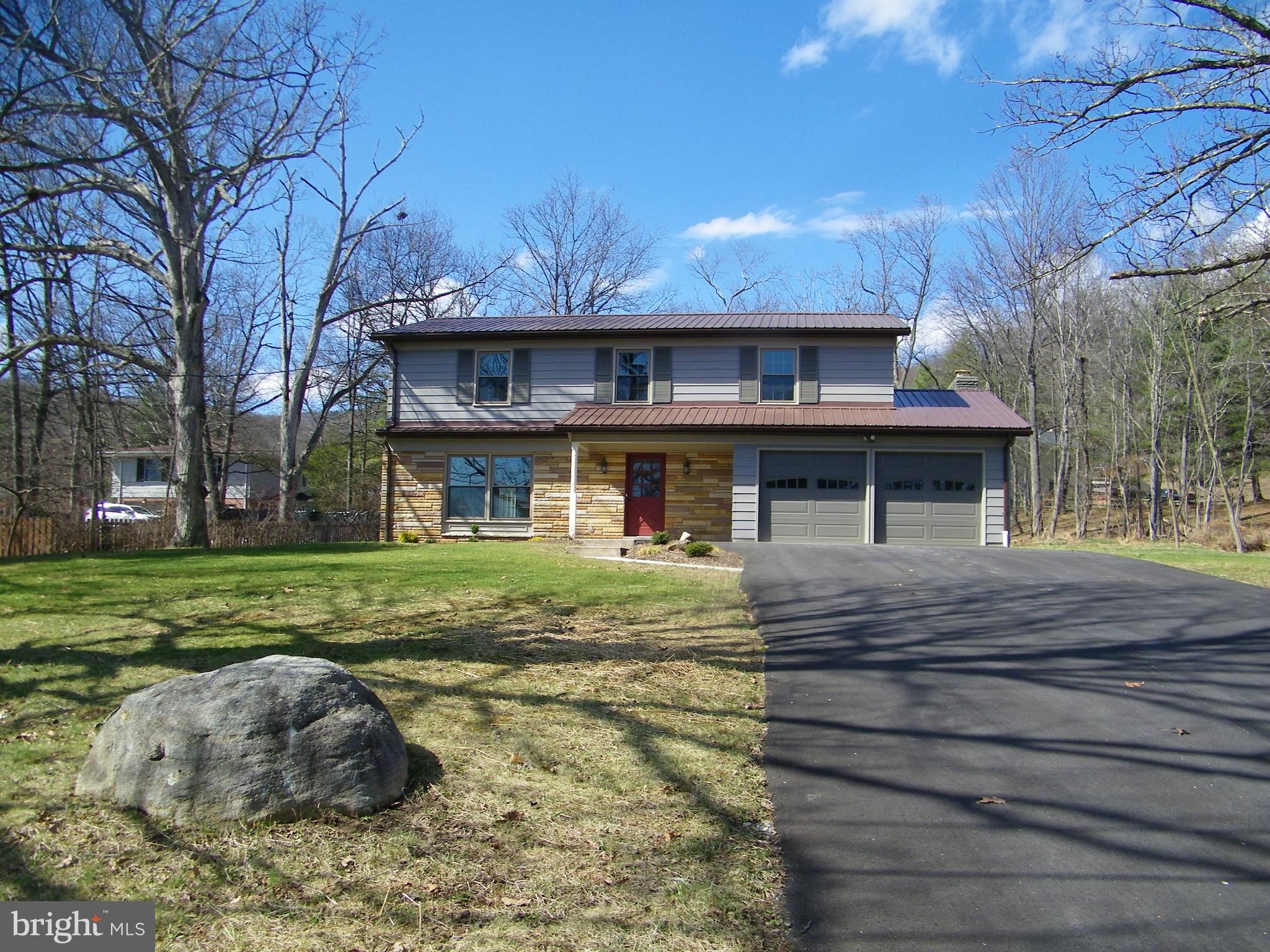 This one is a must see!!!  5 Bedrooms, (the bedrooms are true 2nd floor bedrooms which are adequately sized, there is also a room on first  (familly room) which could also be utilized as a bedroom, this feature is very difficult to find, 2 1/2 baths, living room, dining room, kitchen, family room, sun room and two car attached garage.  All the work has been done for you, move right in have dinner that evening.    Recent improvemtnts include new furnace, heat pump and air conditioning, new ductowrk due to previous bb heat, new kitchen appliances, new granite countertop, new painted glass backsplash (easy clean and use dry erase markers like a whiteboard), replacement windows, new flooring in kitchen, breakfast nook, laundry room and family room, refinished hardwood flooring, interior and exterior painting,  new light fixtures, new faucets and shower heads,  new garage doors, blacktop driveway, new water and sewer line from tap at street to house, regraded backyard and new french drain installed.