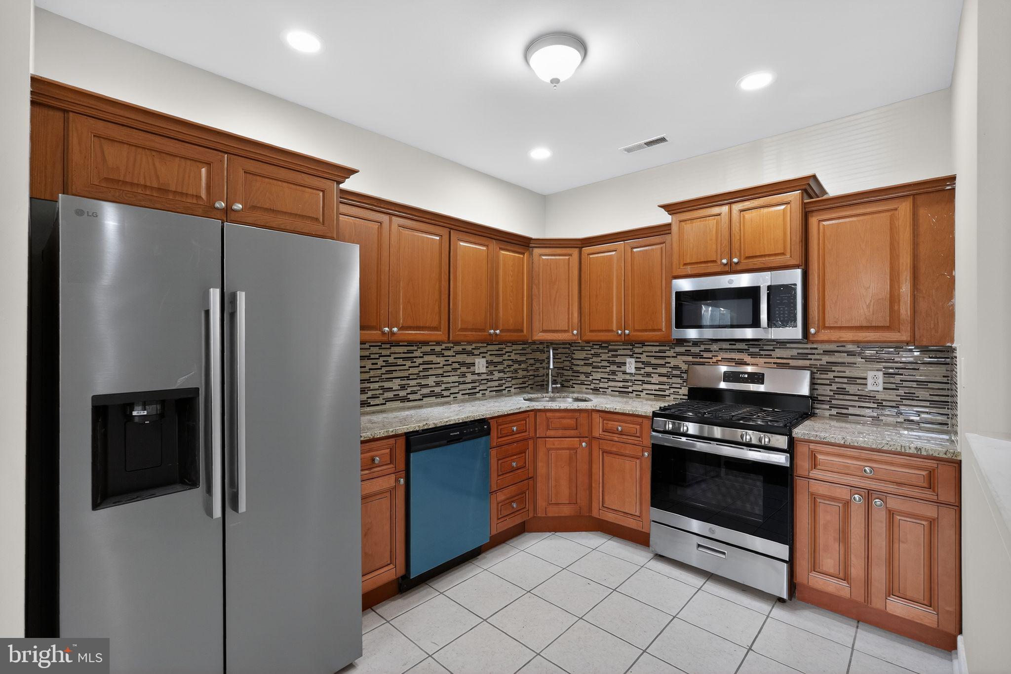 Welcome to 1630 Welsh Rd #25D. This well-maintained first-floor condo offers a spacious and comfortable layout with easy one-floor living. The open living and dining area provides plenty of room for everyday use and entertaining. The kitchen has been updated and offers ample cabinet space, good counter space, a range, dishwasher, and stainless steel refrigerator. The main bedroom includes a large closet and an updated private bathroom, while a second bedroom and an updated full hall bathroom provide additional flexibility. The home also includes a large laundry room with a washer and dryer, and is move-in ready.