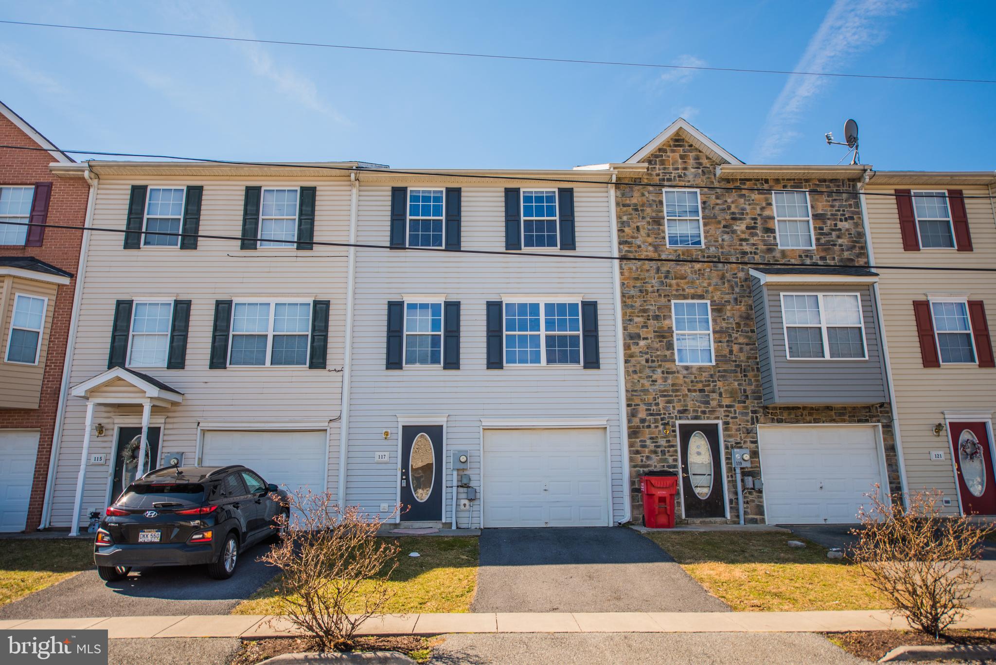 Spacious townhome  with open main floor plan and 3 levels to spread out. New bamboo floors on upper 2 floors and new carpet on stairs. Rec/Family room on first level with separate laundry area. This home has also been freshly painted. You don't want to miss this affordable home. Convenient to everything!