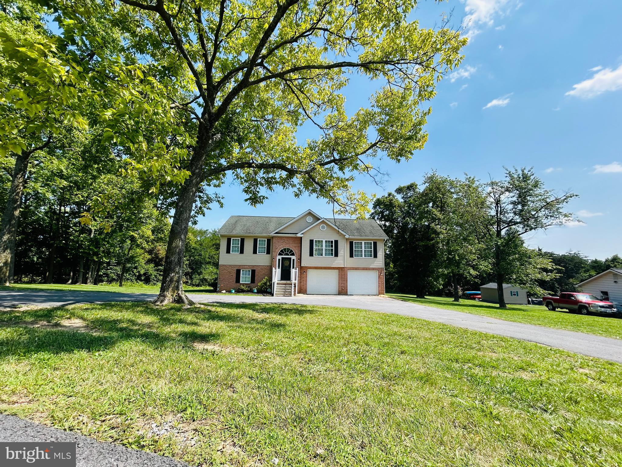 Charming Single-Family Home with Mountain Views in Gerrardstown, WV
Welcome to your serene retreat in Gerrardstown, WV! With stunning mountain views that create a peaceful setting, this inviting single-family home is perfectly situated on nearly an acre of unrestricted land, offering both tranquility and convenience. With its proximity to I-81, your commute will be a breeze. 3 bedrooms, 2 bathrooms with an open concept living area designed for modern living. There is a versatile bonus room downstairs, ideal for a home office, playroom or additional living space. The 2-car garage provides ample storage and parking. This home combines comfort with the beauty of nature, making it a perfect haven for relaxation or entertaining. Don’t miss out on this opportunity to own a piece of paradise with the convenience of easy access to major routes.
Contact us today to schedule your private showing!