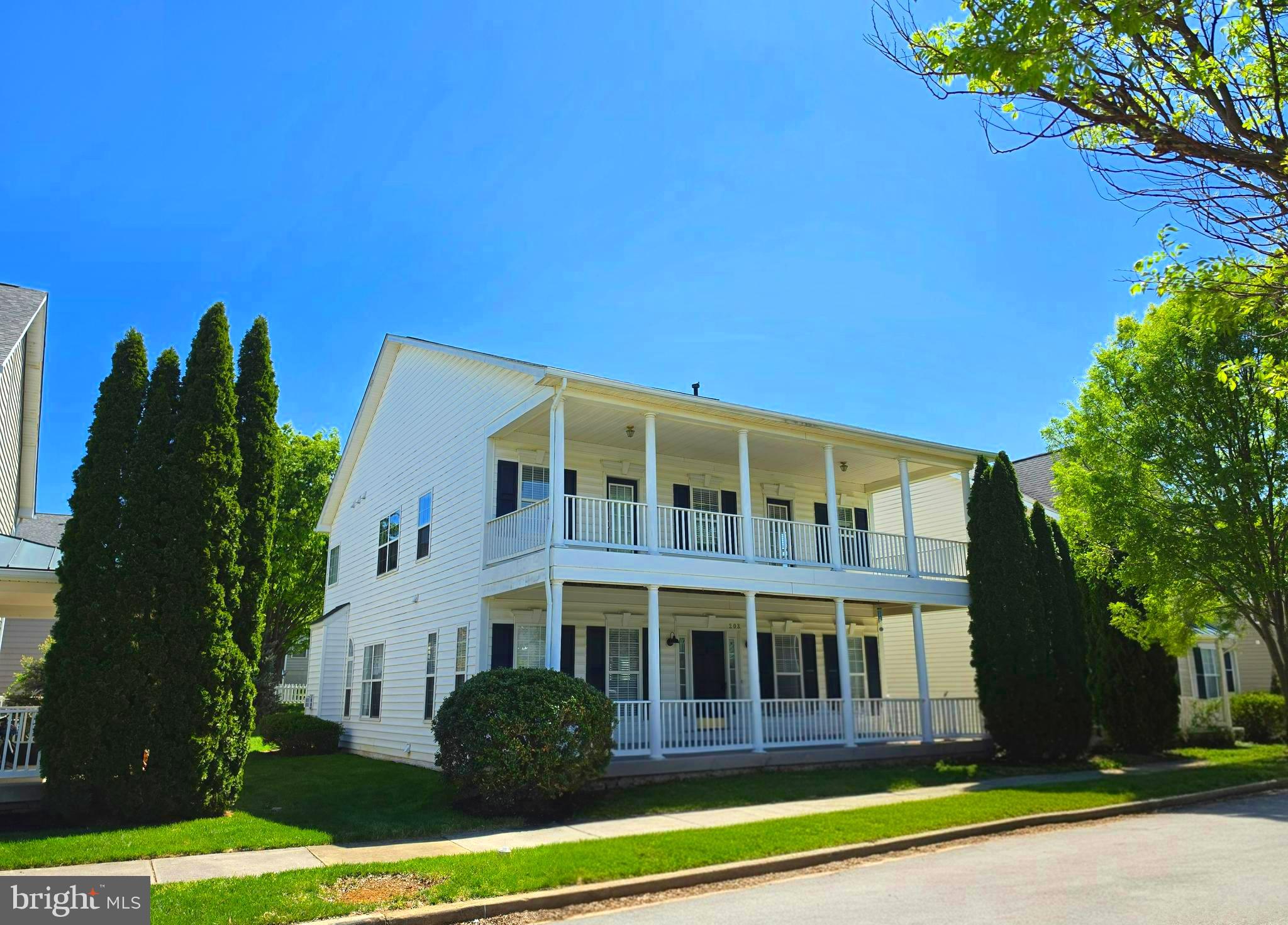 Big and beautiful colonial home, with a two-story porch, on a charming, tree-lined street in Huntfield! Gleaming hardwood floors and loads of natural light greet you as you enter the front door.  The main floor is mostly open, with only a handful of stately columns defining the open space. This floor also features not one, BUT TWO separate offices, as well as a half bath. The kitchen is a gourmet setup with a MASSIVE island, soft-close cabinets, a corner sink, and upgraded appliances. A propane fireplace and 9-foot ceilings round out the best of this floor. Moving upstairs, there are 4 large bedrooms and 3 bathrooms. Two of the bedrooms have their own private bathrooms, while the other two share a Jack-and-Jill bathroom. These two bedrooms also each have their own door out onto the second level of the two-story porch. This floor ALSO features 9-foot ceilings and the laundry room, complete with utility sink, can be found on this level as well. The basement is highlighted with additional living space, as well as a large storage area. Though presently used for hobbies, exercise, and an in-home movie theater, many other options are possible. There is another full bath on this level as well. Around back is the two-car garage, which is accessed via the alley behind the home. The garage was recently drywalled and painted and is ready to continue to faithfully serve the next owners' automotive interests. On-street parking in front of the home is also available. High-school-aged students could walk to nearby Washington High School and in the very near future, the community is slated to add a community pool and basketball courts to its existing green spaces and playgrounds! There's nothing not to love! IF YOU LIKE WHAT YOU SEE, CALL ______ !!!!!!!!