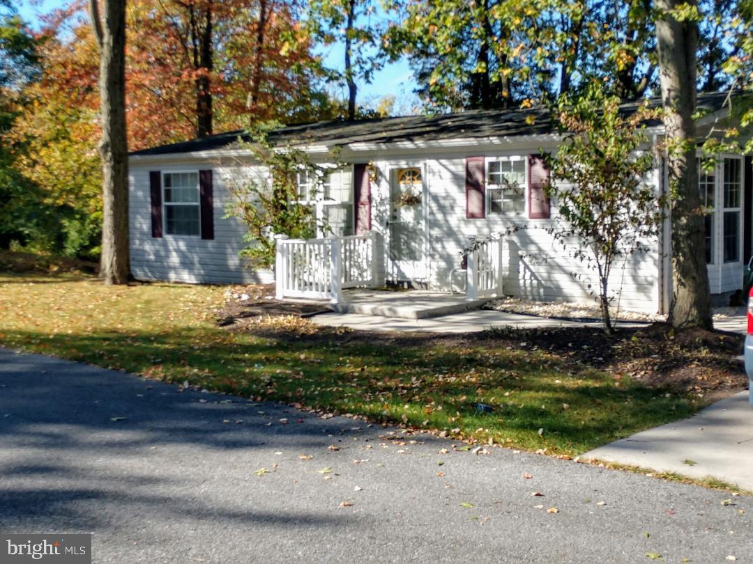 Great 55 plus community, close to all amenities, mature landscaping surrounds the homes in the development,  3 bedroom 2 bath home, spacious kitchen, convenient laundry off kitchen.  Deck to enjoy watching the fall colors change, desirable storage under deck for landscaping needs.  all appliances convey with the sale, neutral decor