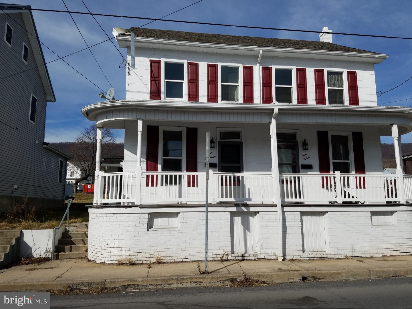 FOR RENT - Semi-detached home with front deck and large back yard. Covered back patio and off street parking Rent includes water, sewer and trash. Tenant responsible for heat, electric and cable. Pets will be considered with an 350 non-refundable deposit.