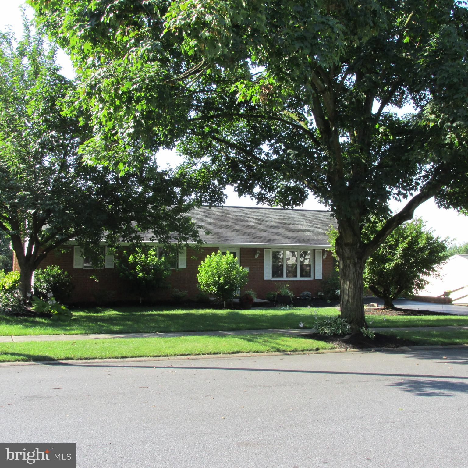 Wow!  This home has so much to offer I may run out of room.  This 4 bedroom 2 1/2 bath ranch home on a no outlet street has been lovingly maintained and upgraded.  Hardwood, ceramic tile, luxury vinyl tile flooring is what you'll find.  Solid surface countertops in both, yes both, kitchens, tile backsplash in the main level kitchen, gas ranges, convection oven, convection microwave, decorative gas stove in the lower level kitchen, central vac, deck, screened in porch, paver patio, fenced yard, shed...  Large family room with a gas fireplace in the lower level, another bedroom and bath suite with a gas fireplace! The lower level would make a great in-law space.  Oversized 1 car garage was converted into a beauty shop (equipment has been removed) and could easily be made a garage again or a huge master bedroom with the ability to make the half bath and storage room a huge master bath.    Didn't I say there was alot in this home!  You have to add this to your tour list.  Call today!