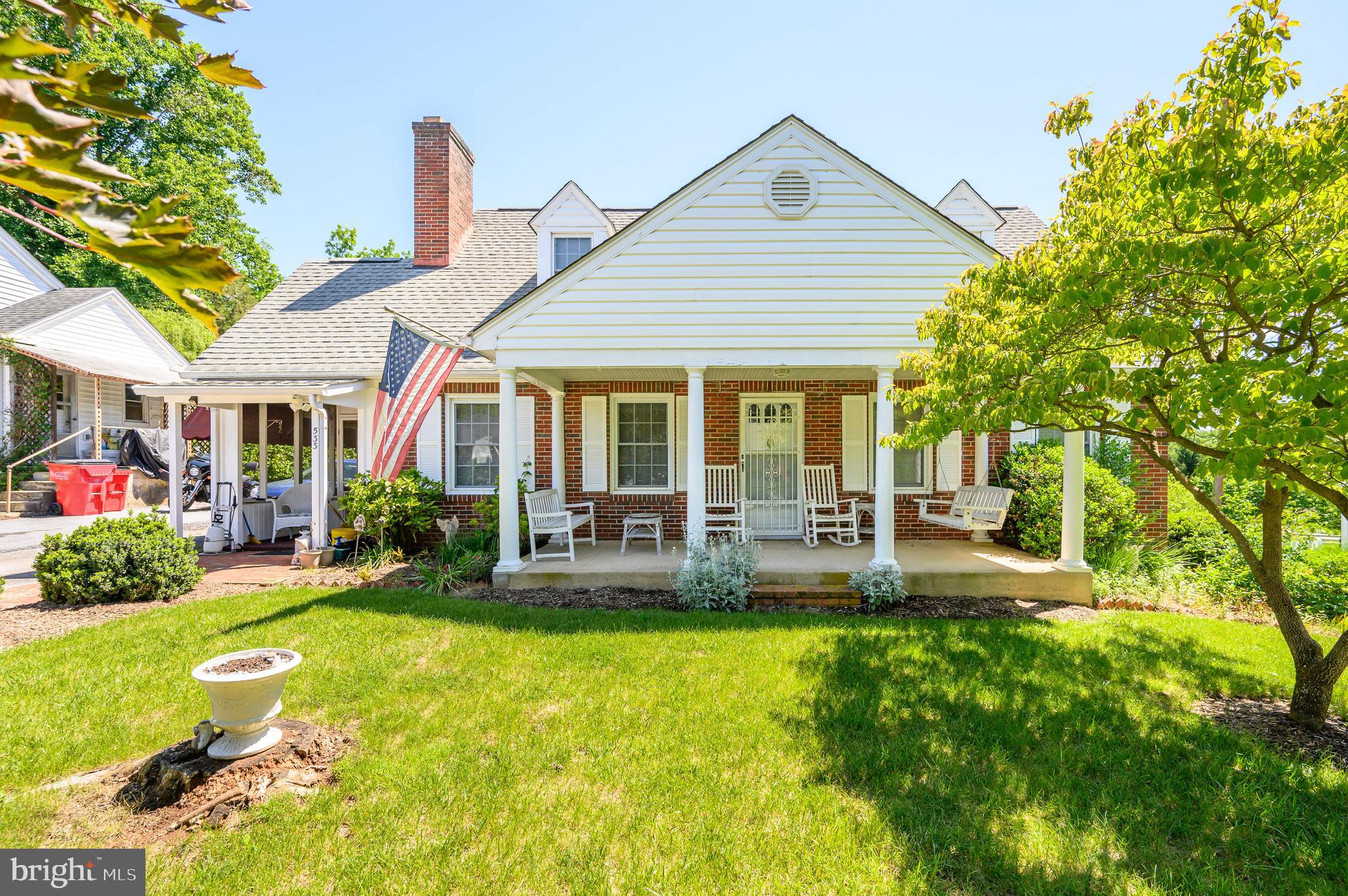 Discover the perfect blend of comfort and convenience in this charming brick cape cod, located on one of the most desirable streets in Charles Town. First floor features living room w/ wood fireplace, spacious family room, dining room and kitchen.  There are two (2) bedrooms, full bathroom, and laundry room to complete the lower level.  Upstairs has two (2) bedrooms which is ideal for an office, craft room or all-purpose room.   The unfinished walkout basement has exceptional flexibility and could be converted to a recreation room or workshop  and has great storage.  Amenities include solid hardwood floors throughout, crown molding and Walkin closets.  Enjoy the comfort of the screened side porch and brick patio off the back porch.  The fenced back yard surrounds the mature shrubs and landscaped yard, blacktop driveway and much more. Located just steps from the Jefferson Memorial Park which offers a new community pool, tennis, pickleball and basketball courts, pavilions, playgrounds and a walking path. Walking distance to downtown shopping, restaurants, major historic sites, and Hollywood Casinos. This house has it all, so don't miss out, schedule your private tour today.  New furnace- 2024 **SHOWINGS ONLY BETWEEN 12 AND 6 PM  (HEALTH REASONS)