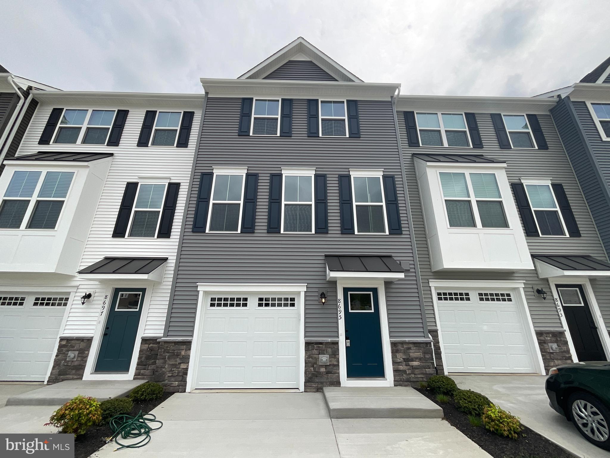 Brand new luxurious home within the sought after Spotsylvania Village community with a mix of detached homes and townhouses. This townhouse has 4 bedrooms, 3 full baths and 1 half bath. A very welcoming and appealing elevation greets your entry. The main level contains the oversized 1-car garage with some workshop space, an in-law suite with 1 bedroom and a full bath. The second level has an expansive open floor plan with beautiful white kitchen cabinetry, state of the art appliances, and a sliding door leading to the large deck for some relaxation. The 3rd level is your privacy area, with a master suite, 2 additional bedrooms and a hallway bath. 
Home is within a half-mile from shopping centers, business offices, and Lake Anna Parkway. It is also about 7 minutes drive to Interstate-95 Highway, Spotsylvania Central Business District, and all the facilities it has to offer. This is the only townhome in this development with 3 full bathrooms that is currently available. Hurry! This one will not last long!
Please review the application instructions prior to viewing or submitting an application!