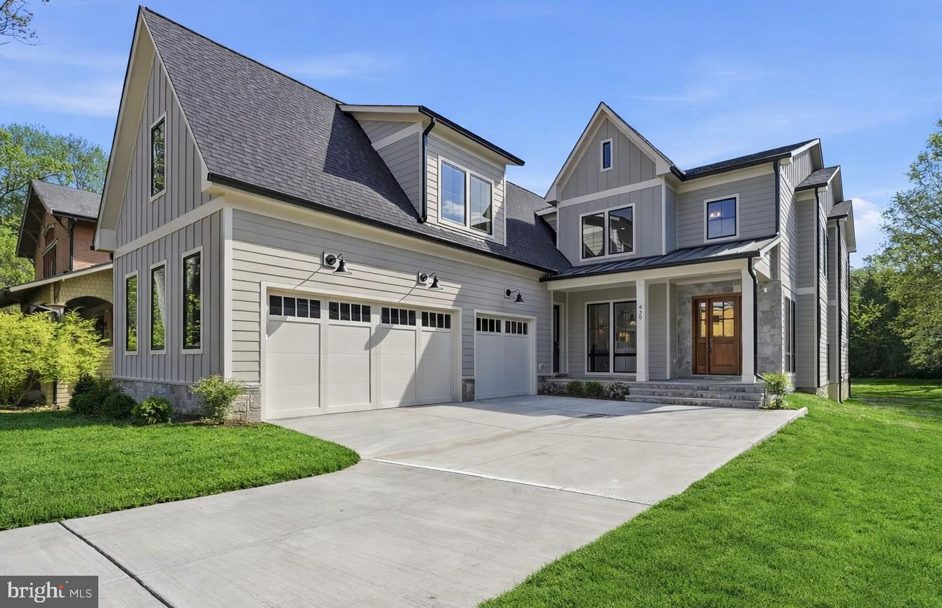 Open Sunday, May 17, 1:00-3:00.  Just Listed from Jefferson Homes.  Exceptional new construction offering over 7,000 square feet of thoughtfully designed living space in the heart of Vienna. This stunning residence showcases clean, modern finishes paired with timeless design, including wide-plank hardwood floors, a chef’s kitchen with oversized center island, quartz countertops, inset cabinetry, and a statement range hood.

The custom floor plan is both functional and elegant, featuring a spacious family room with an Anderson four-panel sliding door that seamlessly opens to a screened-in porch with a stone-front gas fireplace—perfect for indoor-outdoor living. The main level also includes a formal dining room, private study, sun-filled breakfast room, walk-in pantry, guest bedroom with full bath, and a generously sized mudroom with built-ins. A dedicated future elevator shaft, currently finished as walk-in closets, adds flexibility for long-term living.

Upstairs, you’ll find four ensuite bedrooms and a beautifully appointed laundry room. The fully finished lower level is designed for entertaining and everyday enjoyment, complete with a recreation room, game room, full wet bar, fitness room, and an additional bedroom with full bath.

The exterior is equally impressive, blending Hardie-Plank siding and stone with dramatic floor-to-ceiling Anderson 400 Series windows for a sophisticated transitional aesthetic. A three-car garage with electric vehicle charger adds modern convenience.

Ideally located within walking distance to Louise Archer Elementary and Madison High School. Built by Jefferson Homes, a respected Vienna builder with over 20 years of experience, known for exceptional craftsmanship and high-quality materials.

Experience the perfect combination of luxury, functionality, and enduring value in one of Vienna’s most desirable locations.