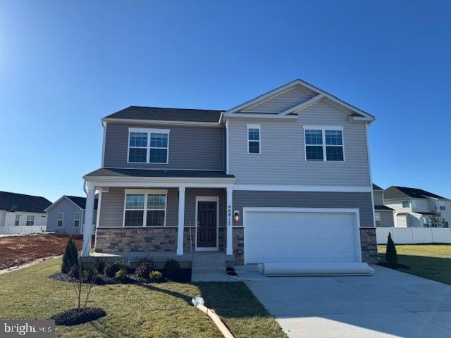 Welcome to The Hayden—a beautifully designed two-story home offering the perfect blend of comfort and functionality. With 5 bedrooms, 3 bathrooms, and nearly 3,000 square feet of well designed living space.  Includes partially finished basement with plumbing rough-ins included.  Just minutes from PAX Air Base.
🌟 Main Level Highlights:
• A flex room off the foyer, perfect as a formal dining area or home office. 
• A chef’s delight kitchen featuring an oversized island with seating, a large pantry, and a seamless flow into the dining and living areas—ideal for entertaining. 
• A main-level bedroom with a full bath, perfect for guests or multi-generational living. 

🌟 Second Level Highlights:
• A luxurious owner’s suite with a large bathroom featuring double vanities, big shower, private toilet, and an expansive walk-in closet. 
• Three additional bedrooms and a full bath, plus a walk-in laundry room for ultimate convenience. 
• A loft-style living space—perfect for a playroom, media area, or additional lounge space. 

Crafted with quality materials and exceptional attention to detail, this home comes with 1/2/10-year builder warranties for peace of mind.
Bonus Features:
All DR Horton homes include a Smart Home Package by Safe Haven, featuring smart light switches, Echo device, front door camera, and keypad lock for modern living convenience.
Don’t miss this chance to make The Hayden your dream home—schedule your tour today!