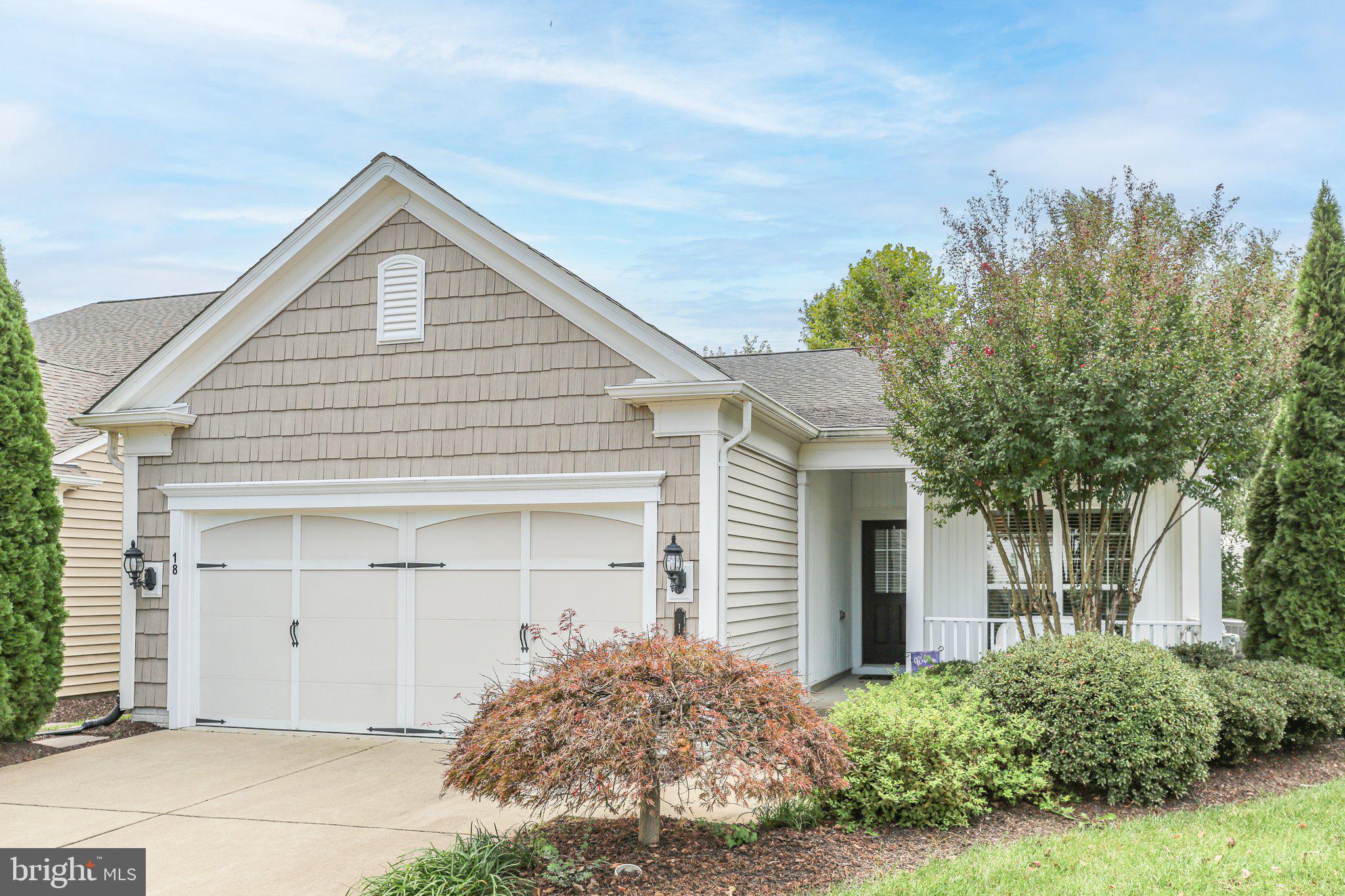Immediate occupancy ! Why wait to build or find something occupied?  This lovely home can be available for immediate occupancy and shows beautifully! Welcome home to 18 Sturgeon Drive, where maintenance-free living awaits in the beautiful Active Adult community of Celebrate Virginia. This meticulously maintained home features numerous upgrades throughout. Step inside to discover two generously sized bedrooms, two full baths, and ample space in the family and dining areas. Enjoy the fabulous screened-in area off the back of the home, perfect for relaxing. Amenities abound in this community, so don't forget to check out the Lodge while you're in the neighborhood.  Schedule a tour today! 

The kitchen offers plenty of counter space, room for a table, and new stainless steel appliances (2023).  The current owner uses the kitchen table space as an office to see out the sunny window! Additional upgrades in this home include new garage epoxy coated flooring, a roof replacement in 2017, an HVAC unit and water heater in 2018, a stunning primary bath renovation in 2021, and a new washer and dryer installed in 2024. This home is truly move-in ready—don’t miss your chance to make it yours! And don't wait for new construction while this house is ready for quick occupancy. 

Some of our favorite features are built-in speakers throughout house, smart thermostat, whole house generator, low maintenance siding and replacement windows, low maintenance decking, alarm system, epoxy coated garage flooring, indoor sprinkler system, outdoor irrigation system, screened porch, lawn maintenance, and eat-in kitchen with a spacious pantry, and an exquisite custom gas fireplace and hearth. 

Schedule your tour today and get moved in immediately!

Community amenities include a lovely Colorado inspired lodge, full-time Lifestyle Director, walking trails, tennis, pickle ball, swimming pools, billiards, bocce ball courts, fire pit, meeting rooms and more. Celebrate Virginia is just minutes from shopping (Giant Foods, Target, Walmart, and Lowes to name a few), close to our quaint Colonial port town offering restaurants and boutiques, close to I-95 (without the noise), commuter lots for those not yet retired, Riverside Dinner Theater, and excellent medical care, too. Come tour this wonderful home today!