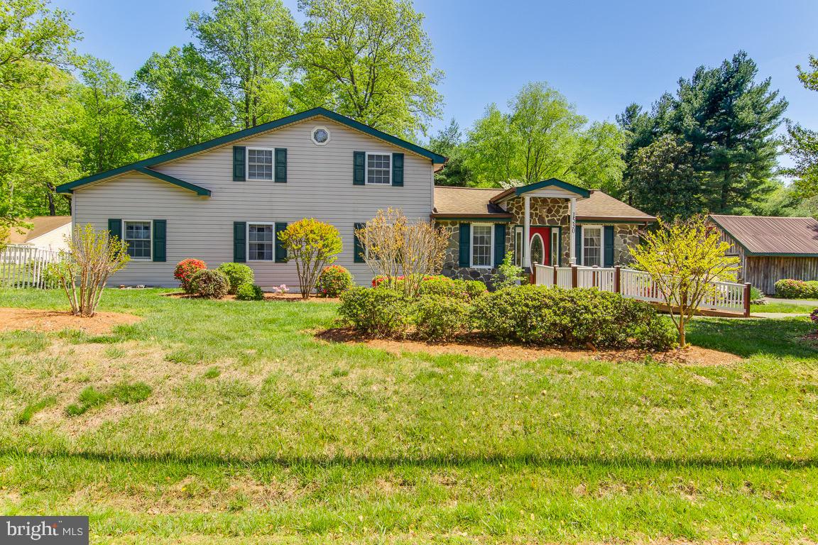 Welcome to your dream home at 1530 Sixes Rd, in peaceful Prince Frederick! This incredibly rare opportunity offers a 4-bedroom/2 full bathroom, 4200sqf rustic inspired home, perfectly situated on a sprawling 4.33 acres. Beautiful gardens, flowers beds and pond welcome you to the property. The inviting feeling of the home is complimented by the charming interiors and well-appointed kitchen, spacious bedrooms, and a master suite. Outside, there's plenty of parking space and three fenced pastures, ready for your horses to graze. The barn itself features 3 large, padded stalls, water and electric, a hay loft elevator, and a tack room, ideal for the horse enthusiast. There is also a groomed sand arena and a round pen for training and exercising your equine friends, and a large tool shed to accommodate all your tools, toys and heavy equipment.