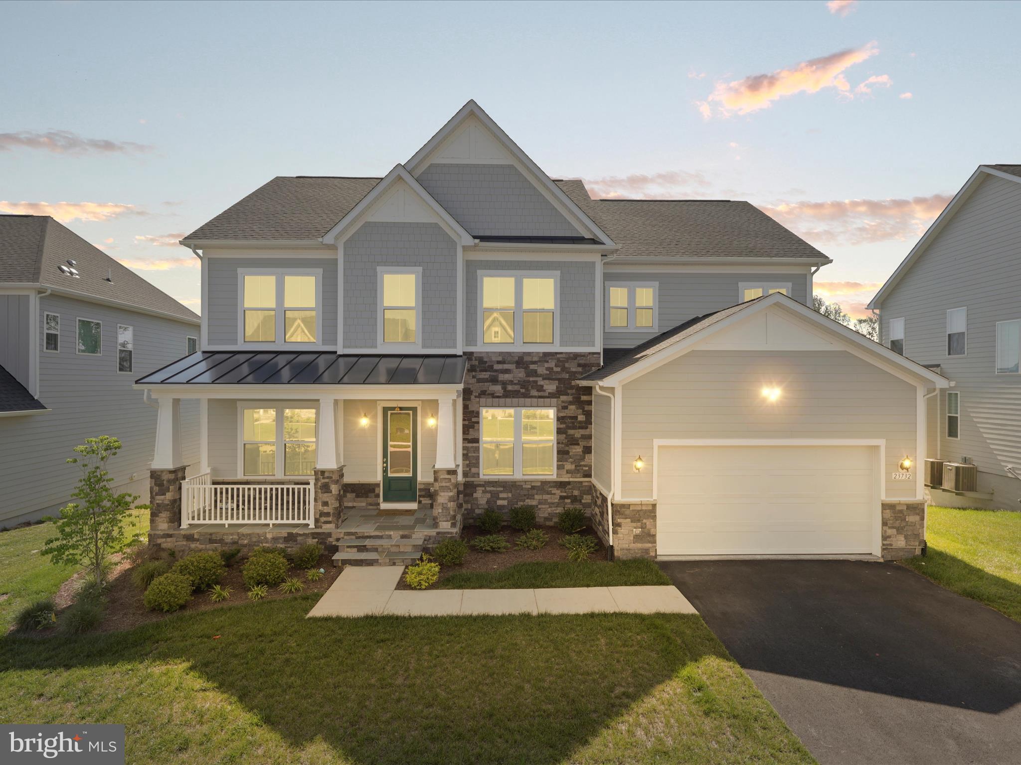 Discover the perfect blend of luxury, comfort, and style in this stunning DRB Richmond model—where thoughtful design meets high-end living in every detail. Spanning over 5,700 square feet of beautifully finished space, this meticulously maintained home offers a warm, light-filled interior and an open layout ideal for both everyday living and grand entertaining.

The heart of the home is the gourmet kitchen, beautifully appointed with quartz countertops, floor-to-ceiling cabinetry, custom lighting, and sleek designer touches. Just off the kitchen, the spacious family room features striking custom wood ceiling beams that add warmth, character, and architectural charm. Throughout the home, you’ll find luxury vinyl wide-plank flooring on all three levels, elegant crown molding, coffered ceilings, and eye-catching modern fireplaces that elevate each space.

This home offers five generously sized bedrooms, four of which feature private en-suite bathrooms for ultimate comfort and privacy. The owner’s suite is a retreat of its own, showcasing a spa-inspired Roman shower with frameless glass, dual rainfall fixtures, and floor-to-ceiling tile. A separate sitting area and spacious walk-in closet complete the suite, with a conveniently located laundry room just steps away.

Nestled in the vibrant Hartland community, residents enjoy access to top-tier amenities including a resort-style pool, fitness center, tennis and basketball courts, playgrounds, and scenic walking trails. All just minutes from shops, restaurants, Dulles Airport, and major commuting routes.

This is more than a home—it’s a lifestyle. Schedule your private tour today.