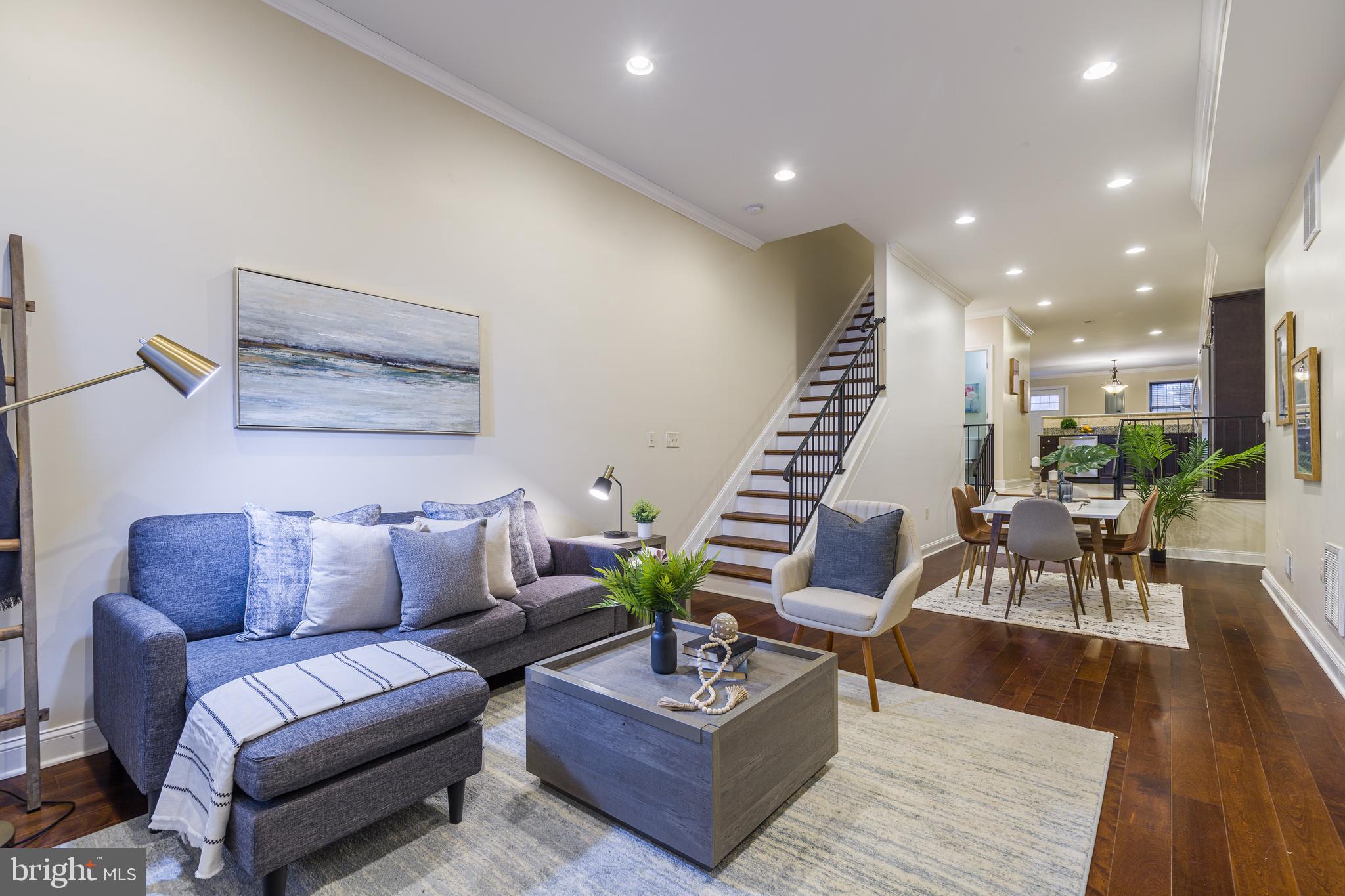 Recently renovated rowhome located in Fells Point featuring 4 primary suites, open floor plan, patio and rooftop deck with views of the harbor! Spacious living area with hardwood floors flows into a flex space that could be used as a dining area. Step up into the custom kitchen with granite counters, stainless steel appliances and a separate dining room. Main level is complete with a powder room and access to outdoor patio. Two primary bedrooms with full baths and laundry on the second level. Third level has additional two primary bedrooms with full baths and access to rooftop deck. Generous size basement provides room for storage needs.