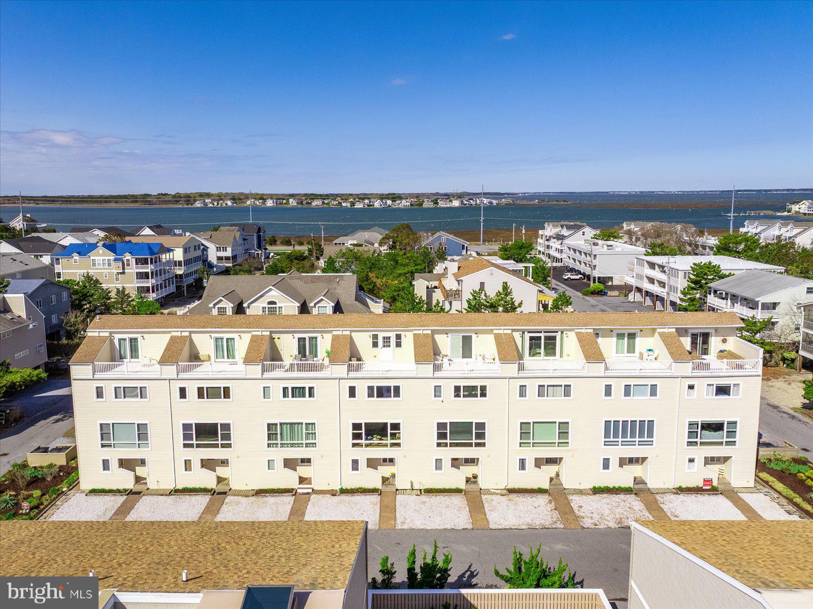 Welcome to your dream beach retreat in North Bethany—this beautifully unique coastal home is just one block from the ocean and offers stunning, oceanfront views! With private parking for two vehicles and direct entry to the main level, this property blends convenience, comfort, and seaside charm. Brand new carpet throughout. The entry level features a guest bedroom with an en-suite half bath, access to a private rear patio complete with an outdoor shower and a utility/storage room—perfect for rinsing off after a beach day and stowing all your gear. Up one level, the main living space features plank flooring, a large living room space, eat-in kitchen, updated powder room with laundry, and breathtaking direct ocean views that truly set this home apart. It’s a cozy, light-filled gathering space ideal for entertaining or relaxing after a day in the sun. The third floor offers two spacious guest bedrooms and a full bath, while the top floor is reserved for the oversized primary suite, featuring an en-suite full bath and access to a private rooftop deck—the perfect perch to enjoy sunrises over the Atlantic. Thoughtful details like exposed beams and coastal beadboard accents infuse the home with a rustic beach vibe, giving it personality and warmth throughout. Whether you’re searching for a lucrative investment property—poised to be the most sought-after rental of the season—or a special place to create lasting memories with loved ones, this home delivers and has the potential to be even better. Enjoy private beach access just steps away, a short walk to Matt’s Fish Camp, and easy access to The Big Chill, Indian River Inlet, and the charming shops, restaurants, and entertainment of downtown Bethany Beach—all just minutes away. If you’ve been waiting for that special place at the beach, you’ve found it!