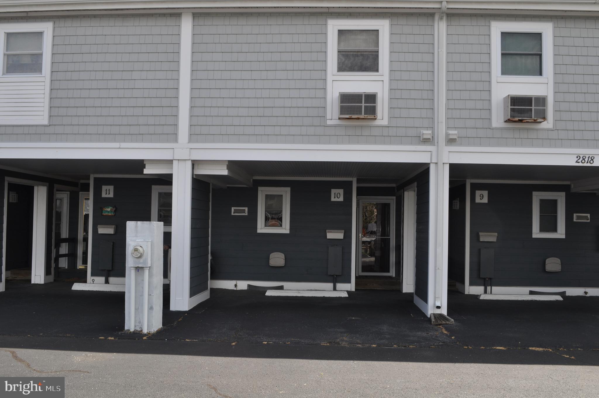 A Little piece of heaven awaits you.  Your Waterfront Beach Retreat and May Be One Of The Best-Kept Condo Complexes In Ocean City Welcome to Old Port Cove West Bayside waterfront beach retreat. Location is everything when it is close to all amenities, shopping, beach ,dining ,and amusement park. etc. FIRST TIME OFFERED, ORIGINAL OWNER. This unit is original per plans and specs. Kitchen has plenty of cabinets and a breakfast bar with all appliances convey. Living room has a vaulted ceiling, wood burning fireplace and spiral staircase.  While sitting in your living room you can look out onto your new Wolf PVC decking with vinyl railings and a gate for added privacy. Project was completed March 2019.  Don't forget about your assigned boat slip right in front of your deck, all you need is to bring your boat. Upper level is a large loft bedroom, full bath, his and her closets and laundry facilities. There is also a private salt water pool for those hot summer days and nights to relax by.  Private parking