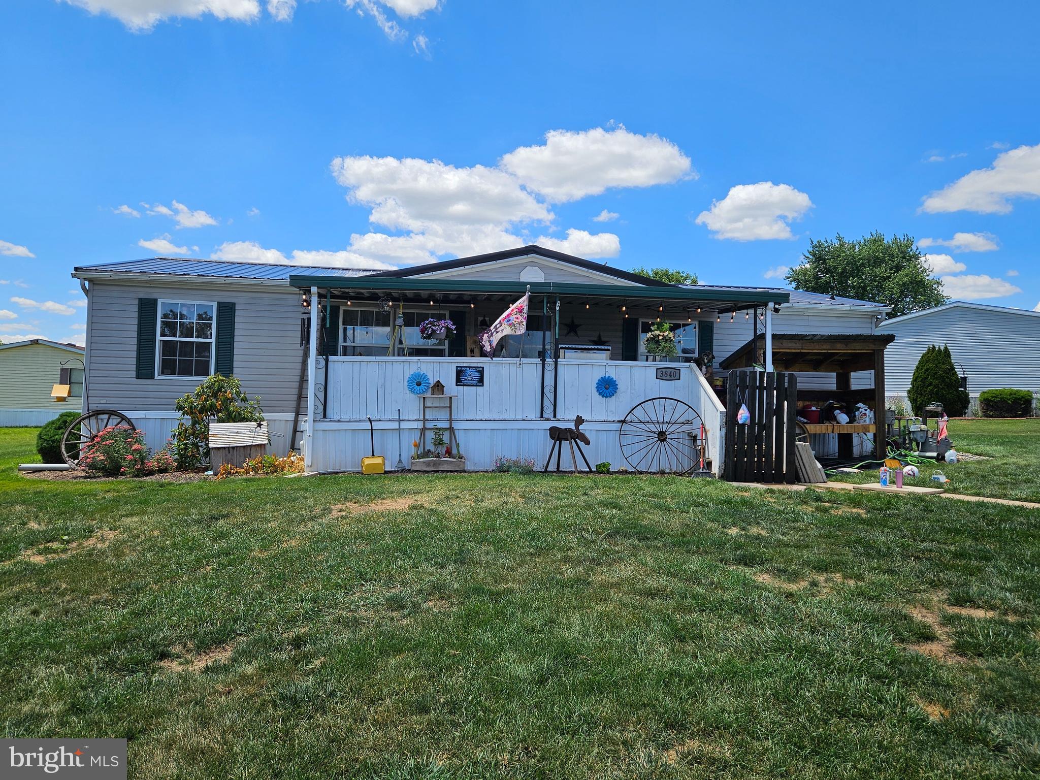 Welcome to 3840 Craig Avenue, Dover in Tall Oak Estates!  This 1998 Redman double wide home is on a spacious corner lot!  This 3-bedroom, 2-bath home offers a functional floor plan featuring a living room, dining room, breakfast area, and kitchen with abundant oak cabinetry.  The primary suite includes a private bath with a garden tub and separate shower.  Enjoy outdoor living from the front and side decks, plus a backyard shed for additional storage.  New roof installed in 2025.  Schedule your showing today!